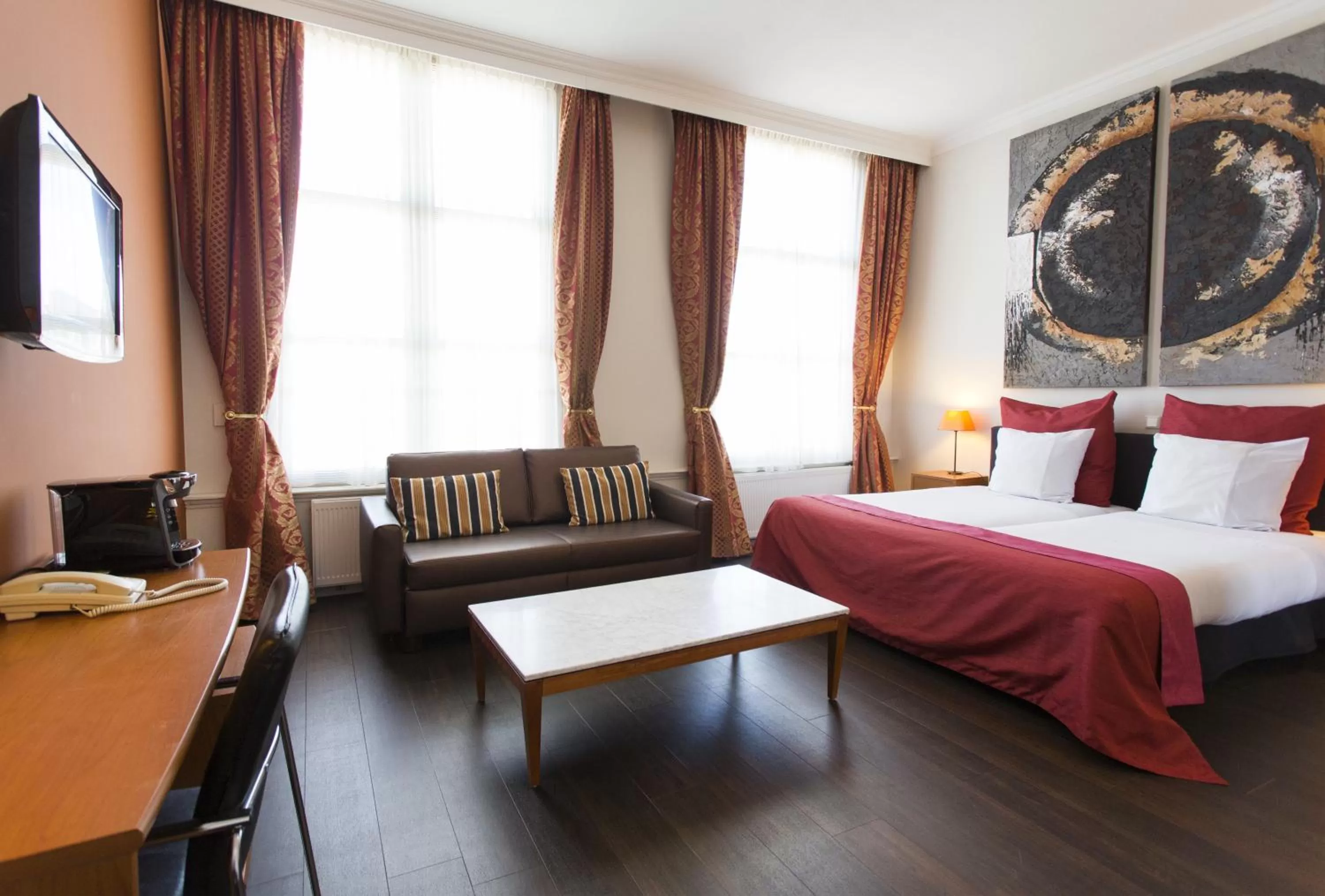 Photo of the whole room, Bed in Grand Museum Hotel, BW Signature Collection