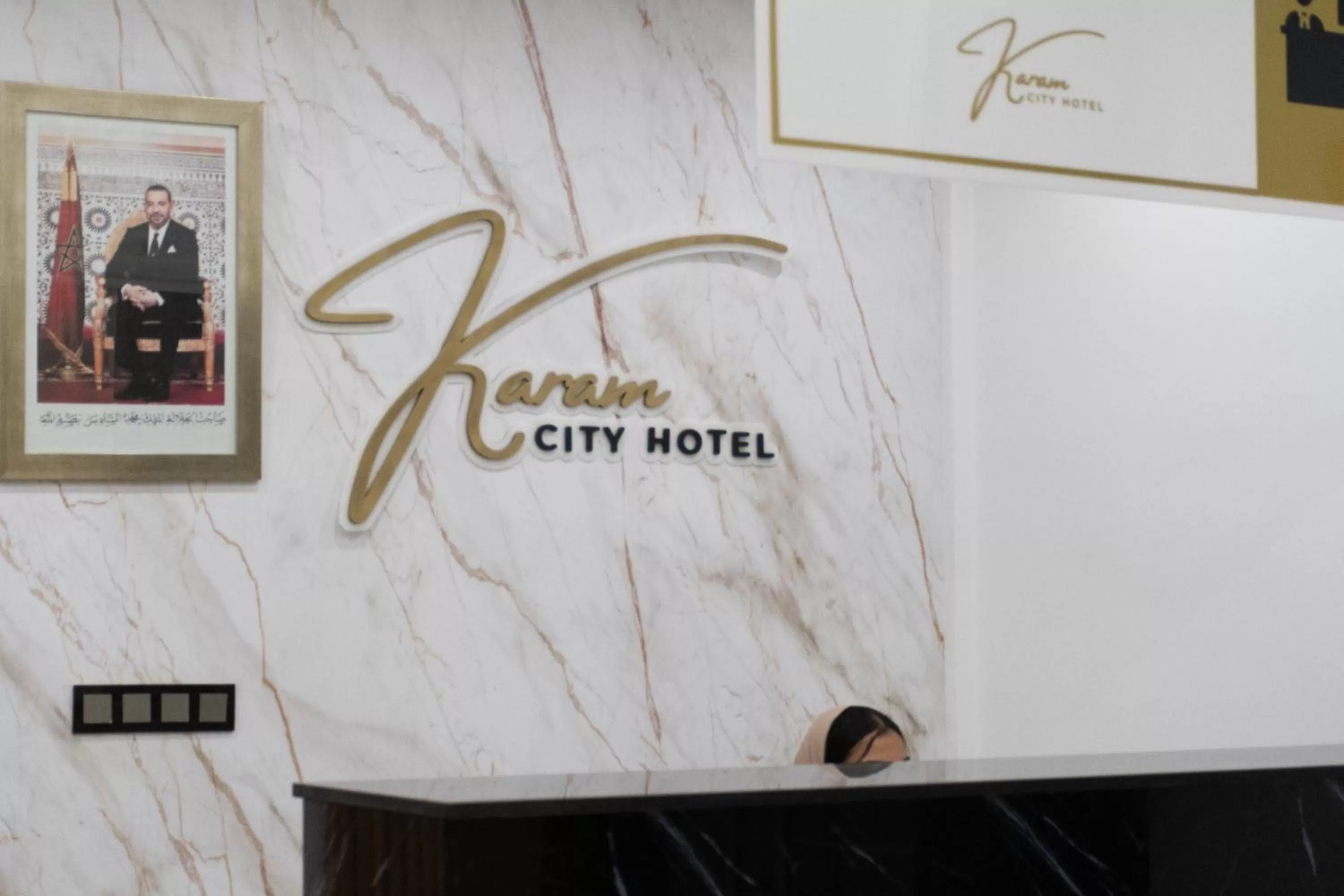 Property logo or sign in Karam City Hotel