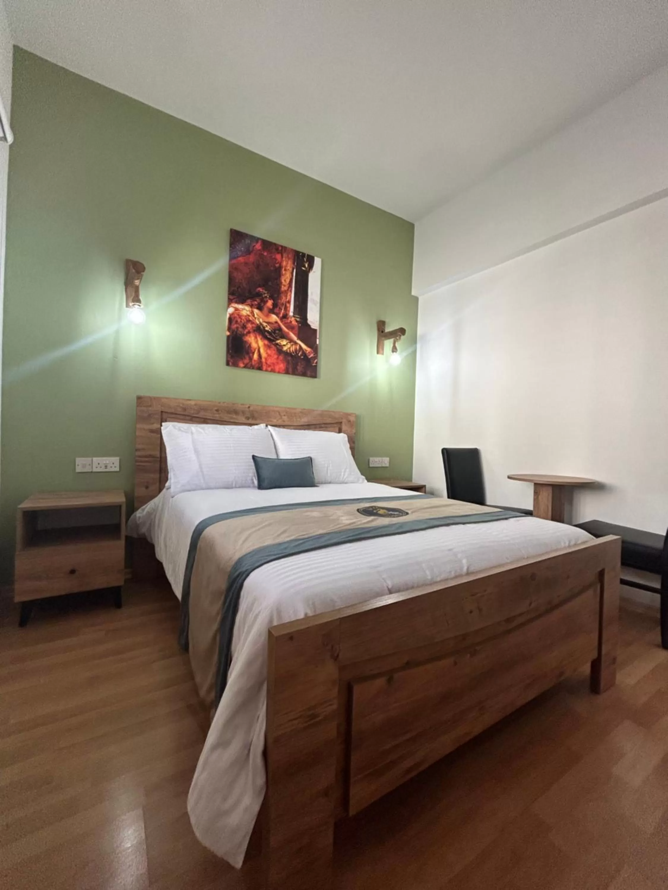 Bed in Royal Goddess Guest House, Walled City