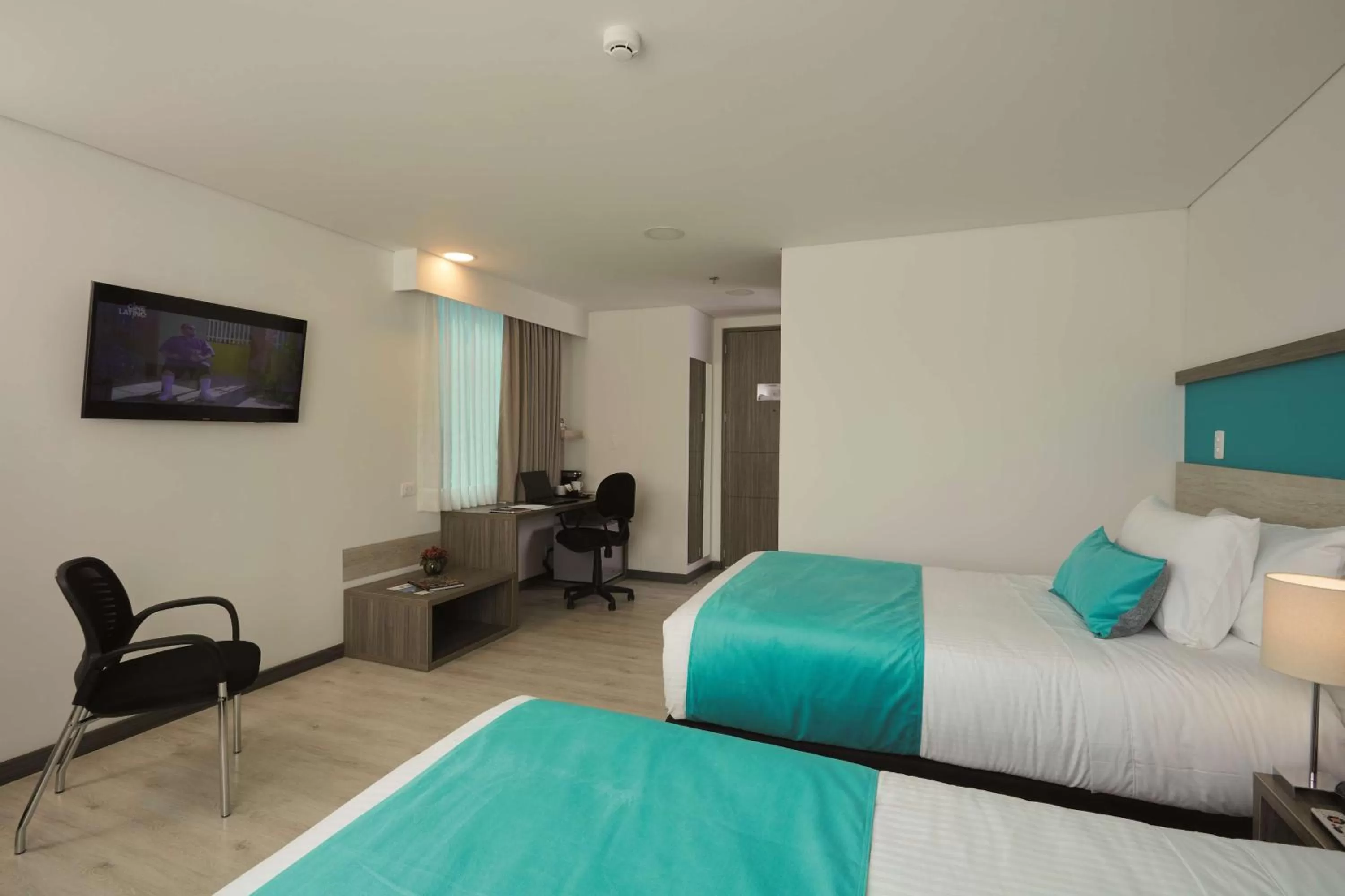 Photo of the whole room, Bed in Hotel Nivari Duitama