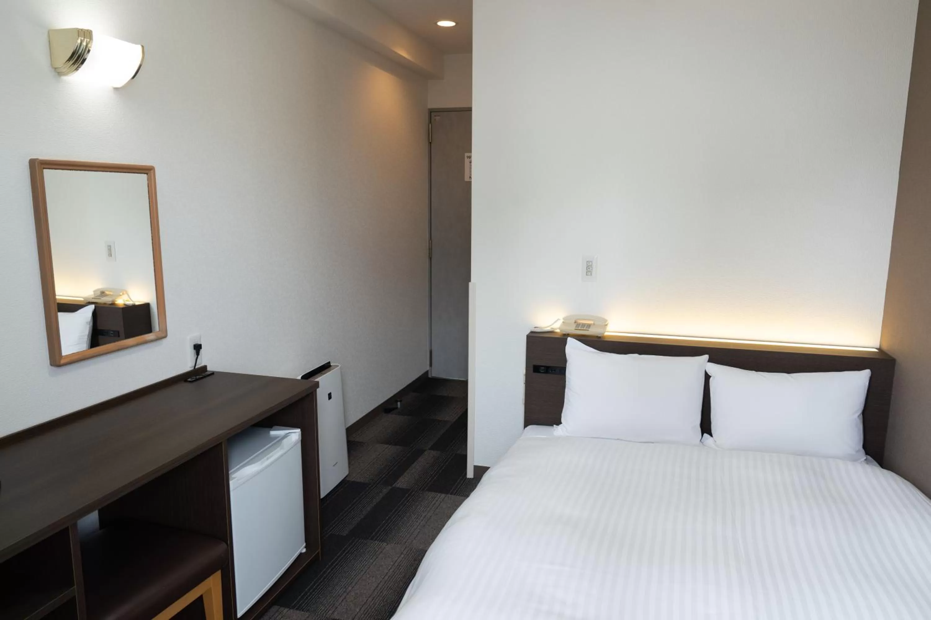 Photo of the whole room, Bed in Heiwadai Hotel Tenjin