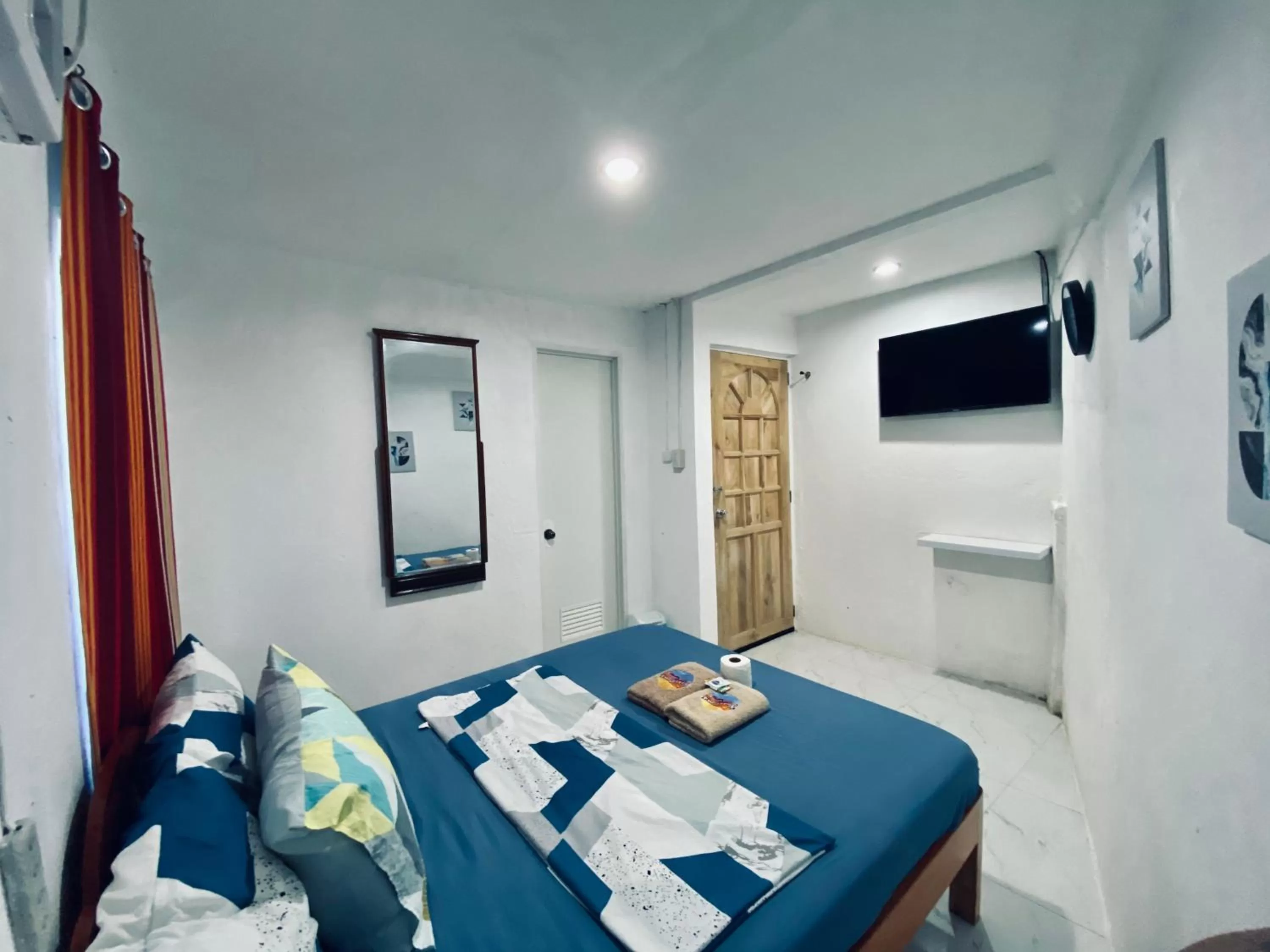 Bedroom, TV/Entertainment Center in West Coast Beach House