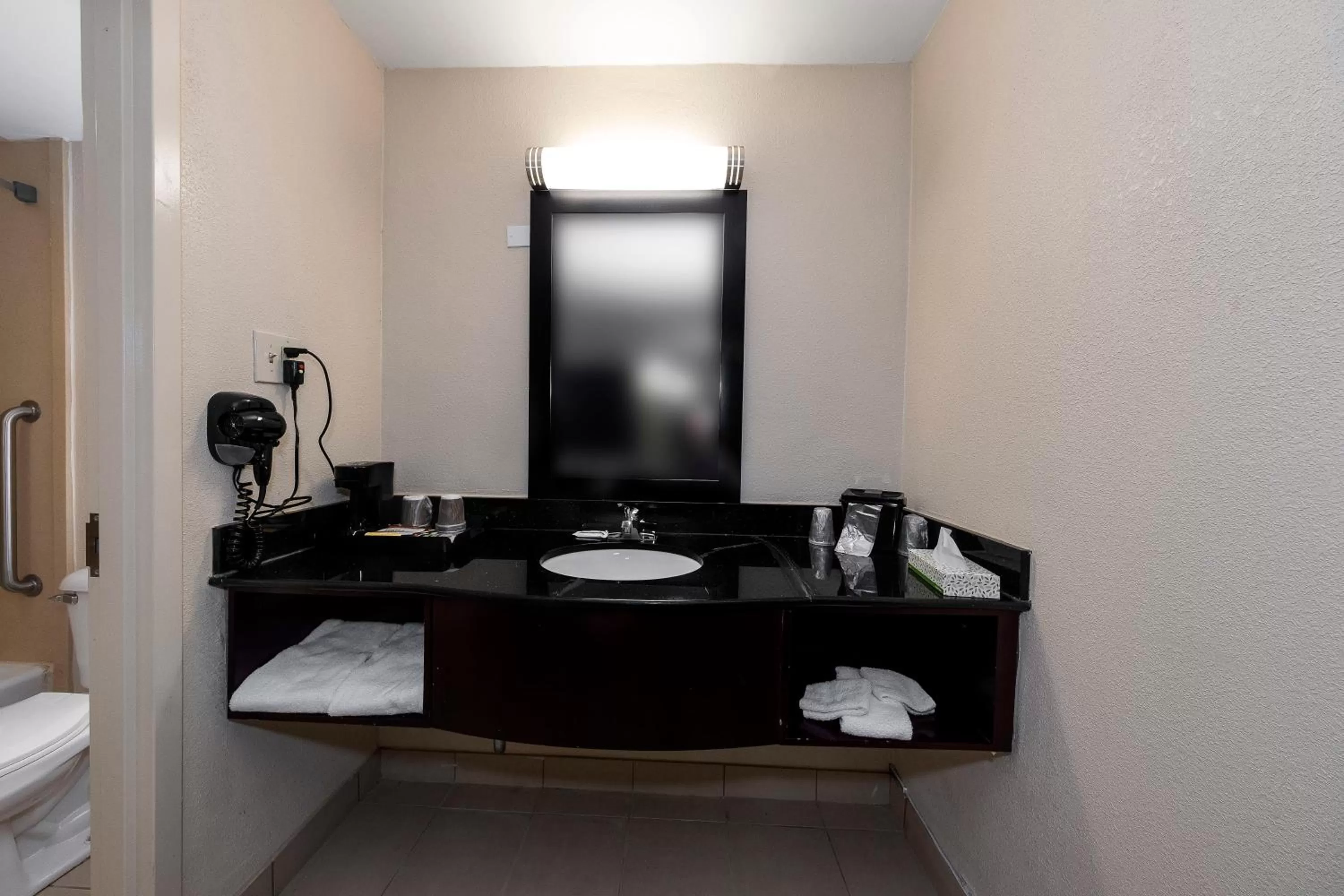 Bathroom in HomeTowne Studios by Red Roof Bordentown - McGuire AFB