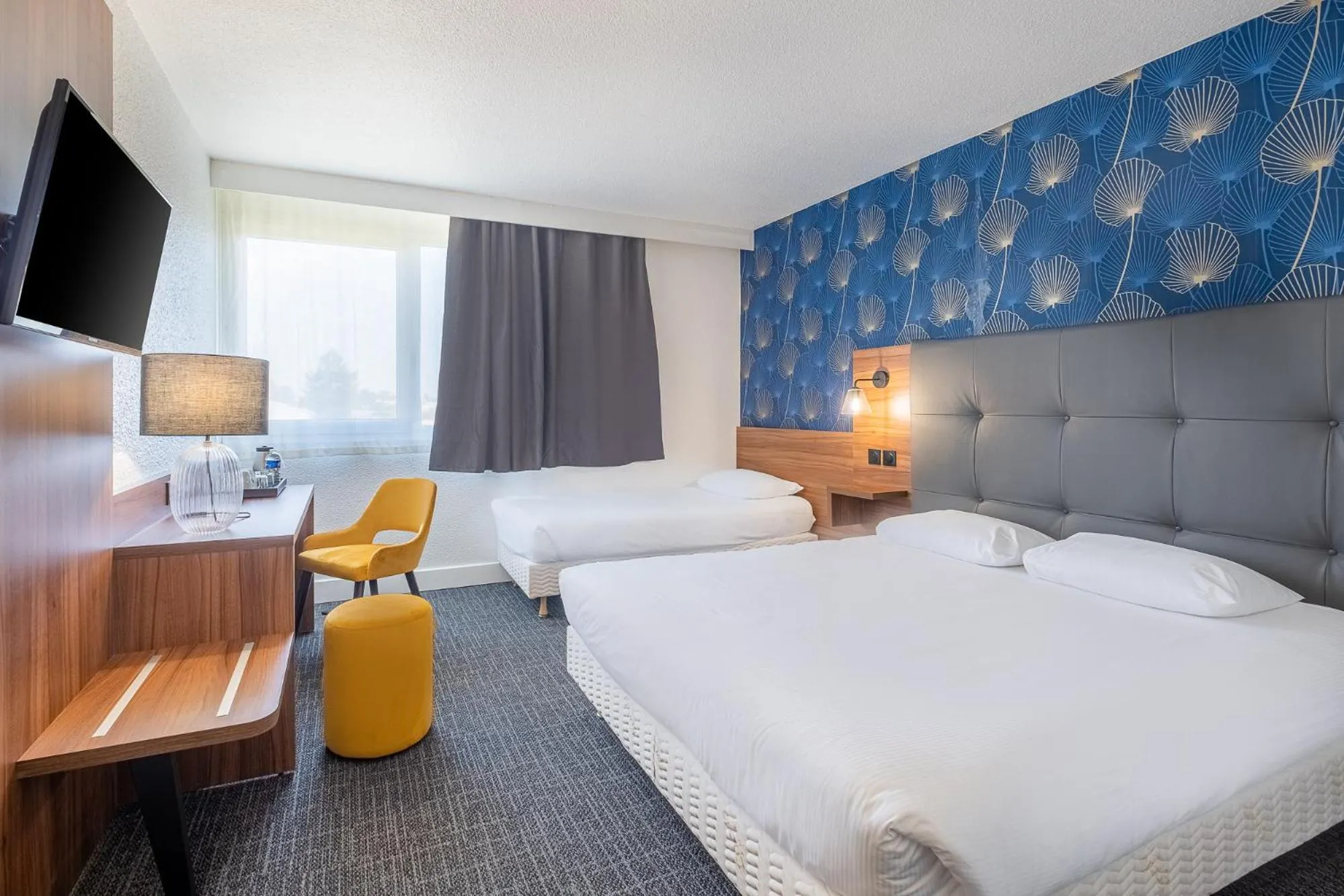 Photo of the whole room, Bed in Hôtel Akena Poitiers Nord Futuroscope