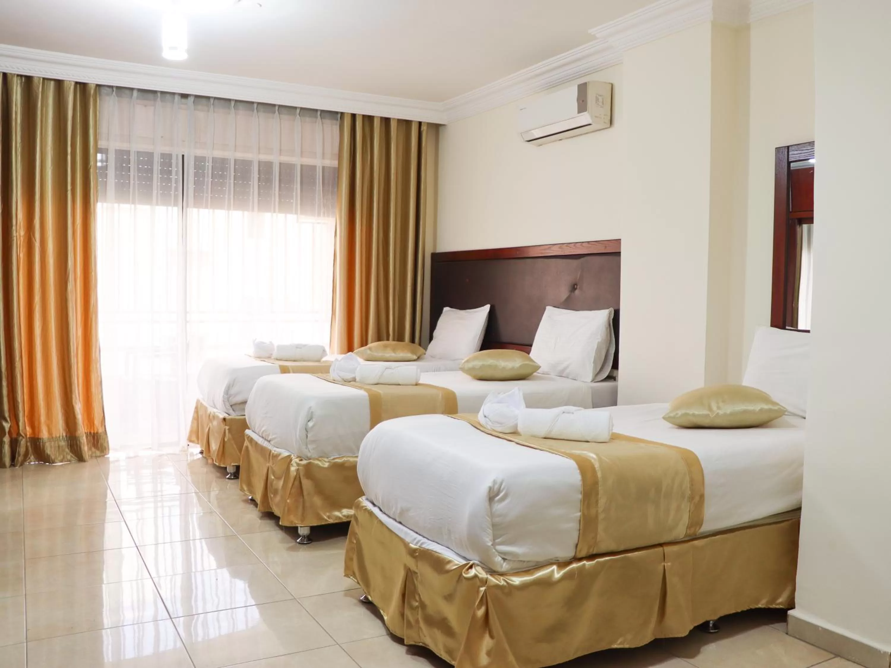 Bed in Al Jamal Suites