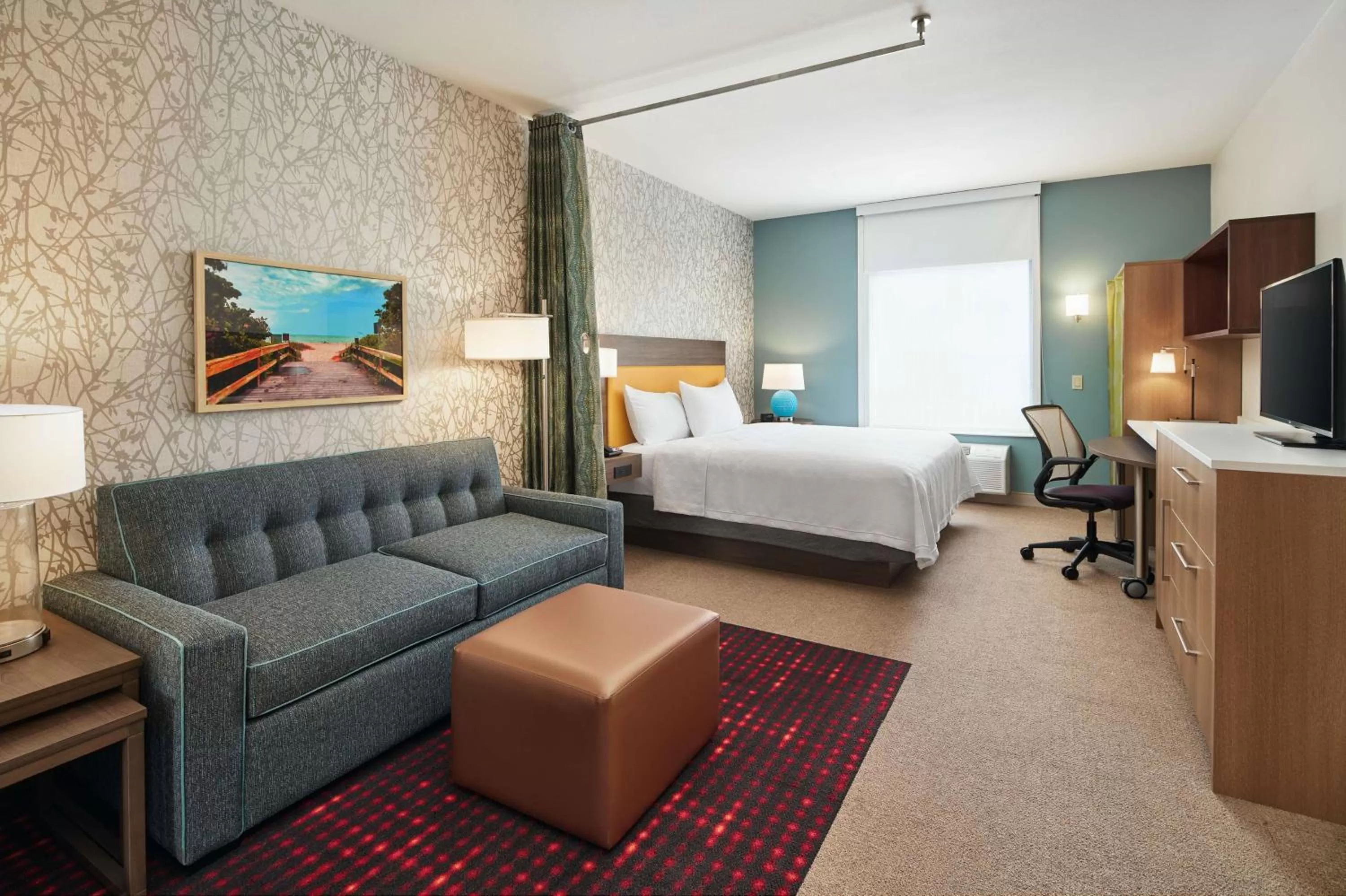 Living room, Bed in Home2 Suites By Hilton Palm Bay I 95