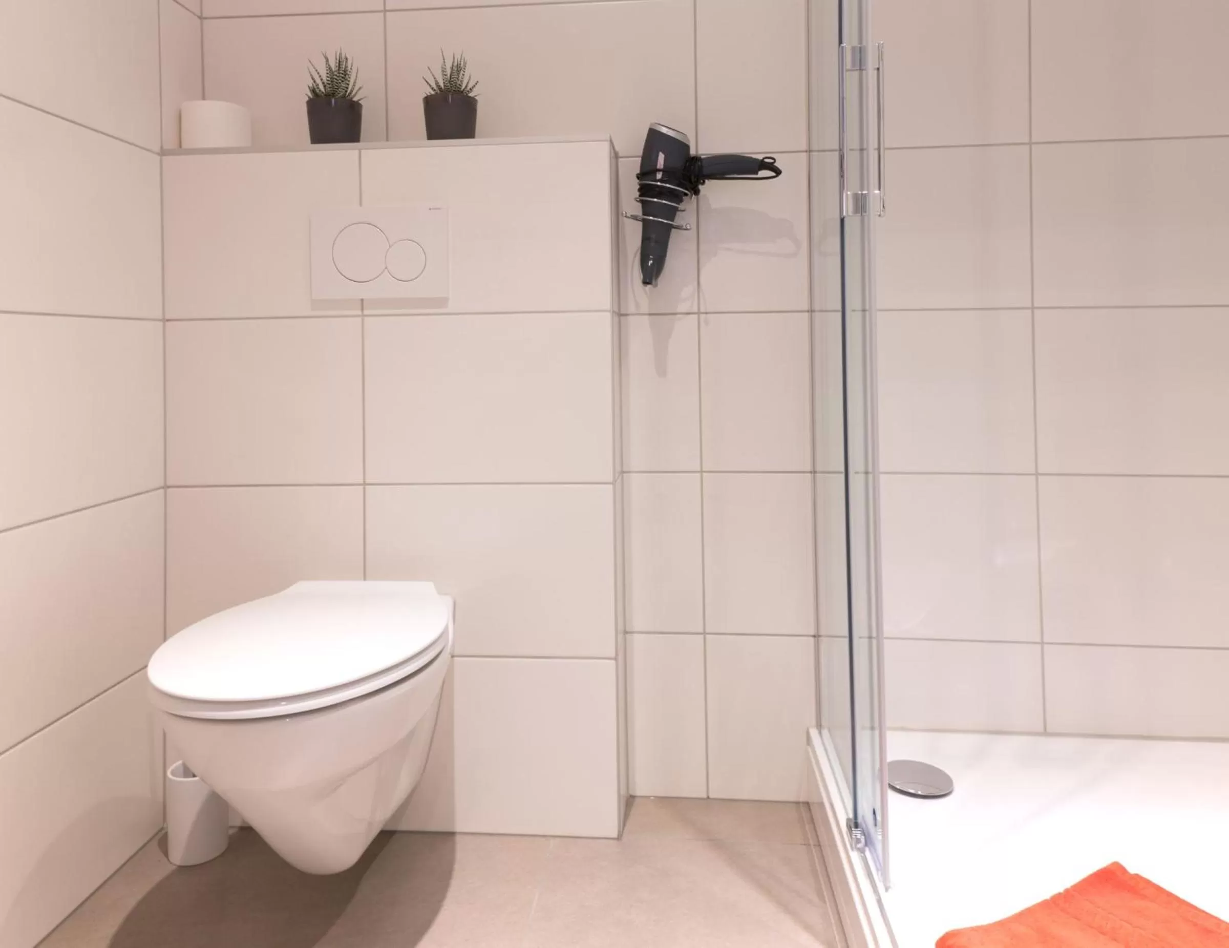 Bathroom in Restaurant & Appartements In Vino Veritas