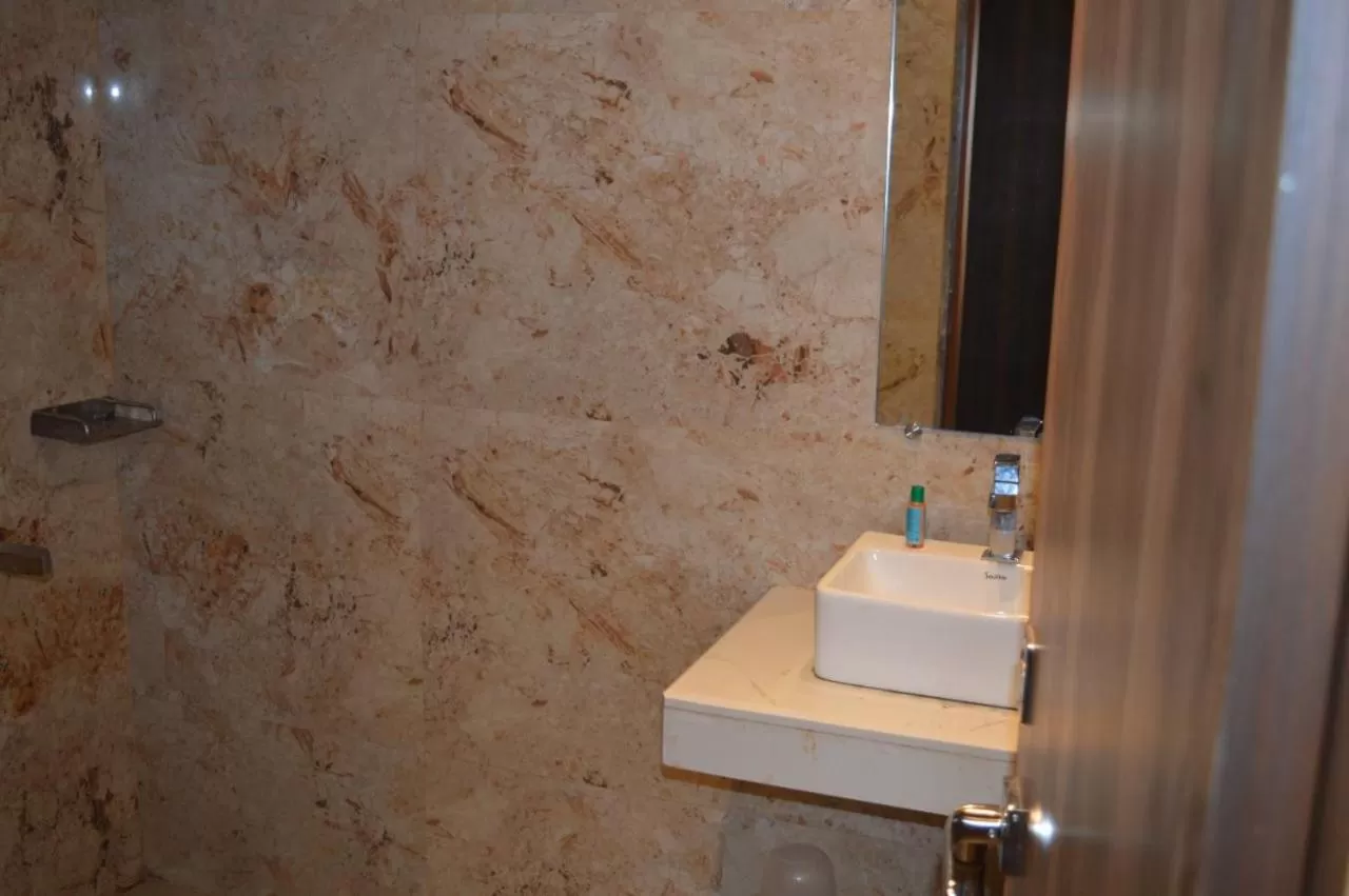 Bathroom in Hotel Byaris International By Bizzgrow Hotels