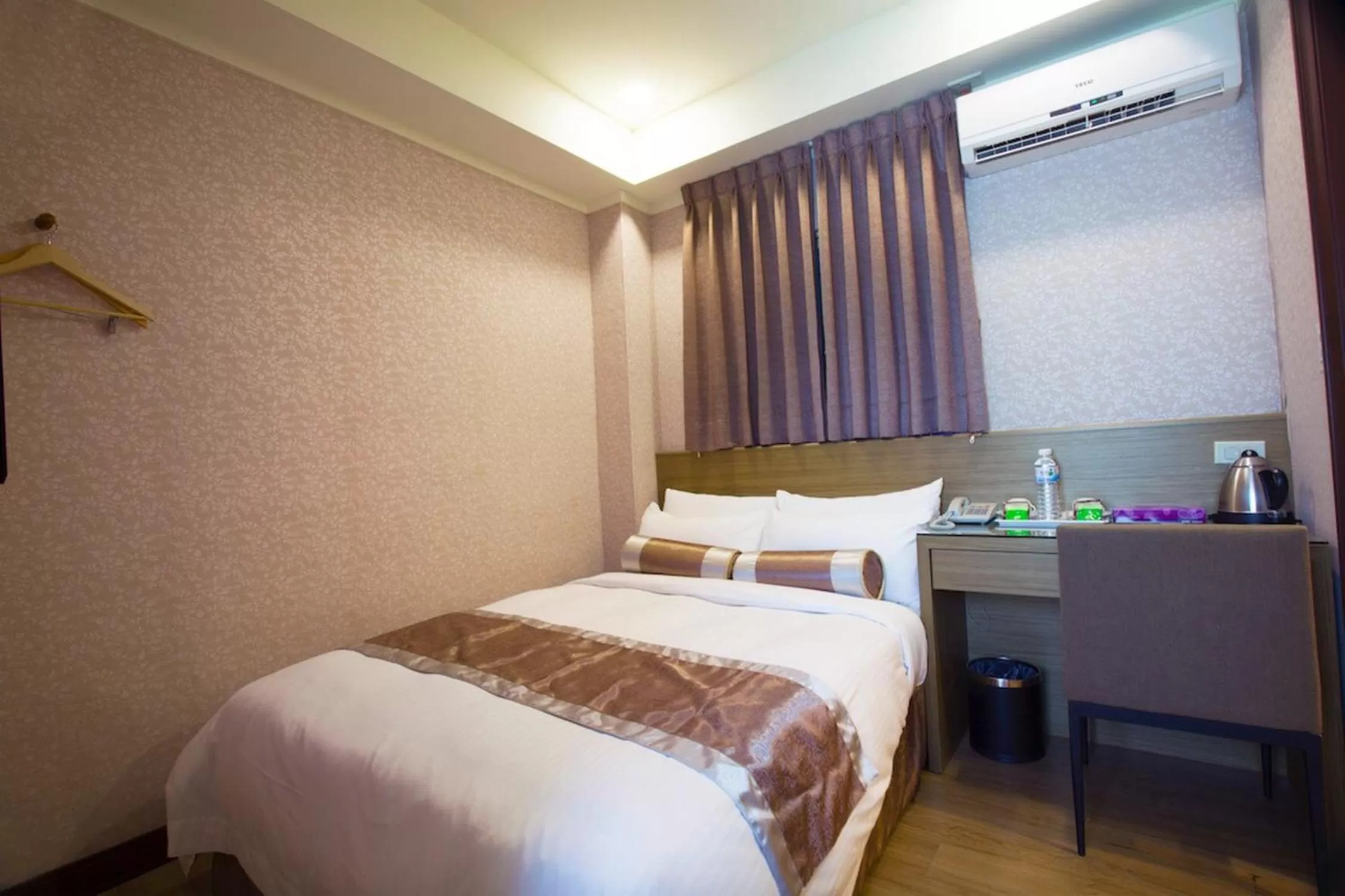 Bed in True Friend Hotel