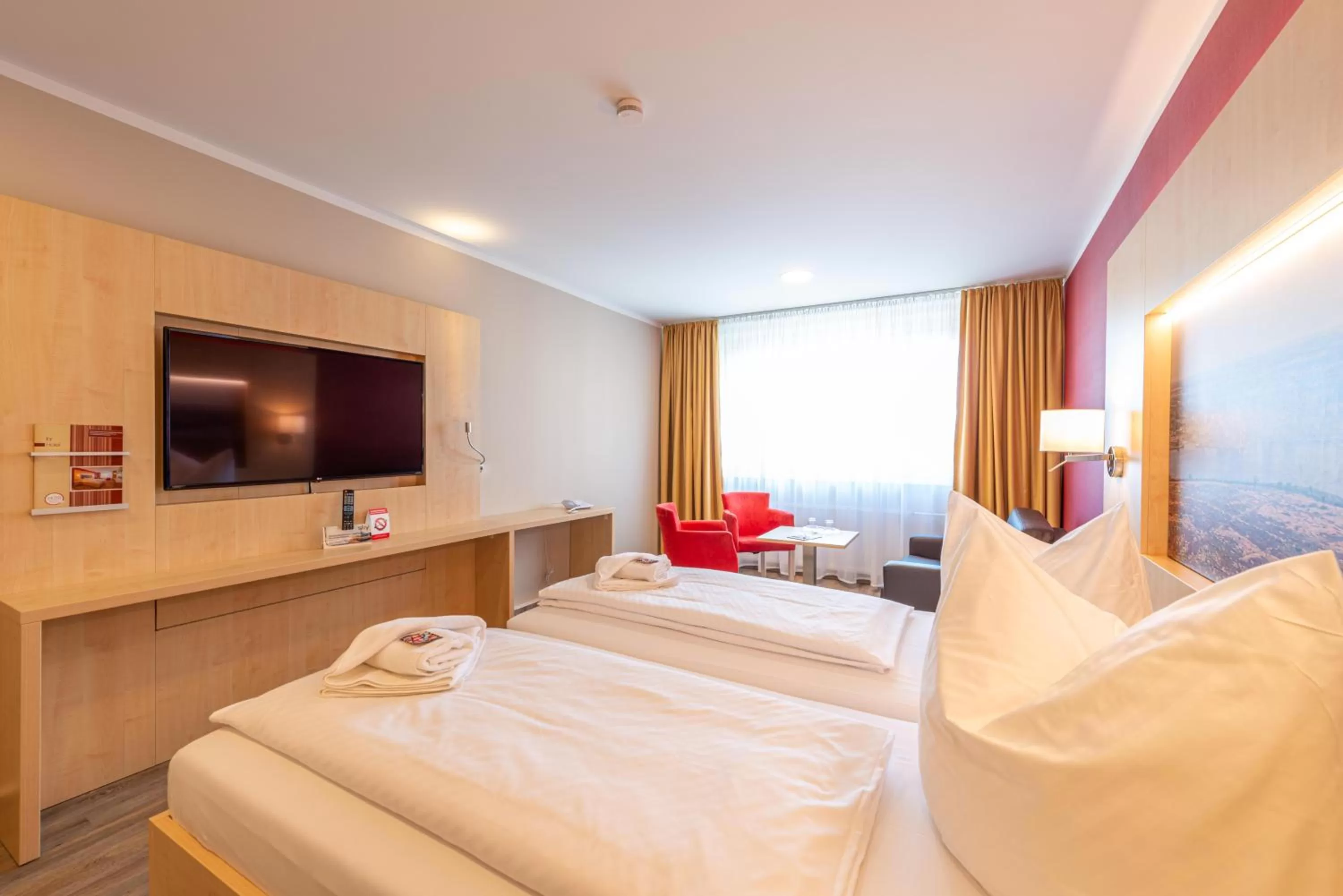 Photo of the whole room, Bed in Hotel an der Stadthalle Rostock