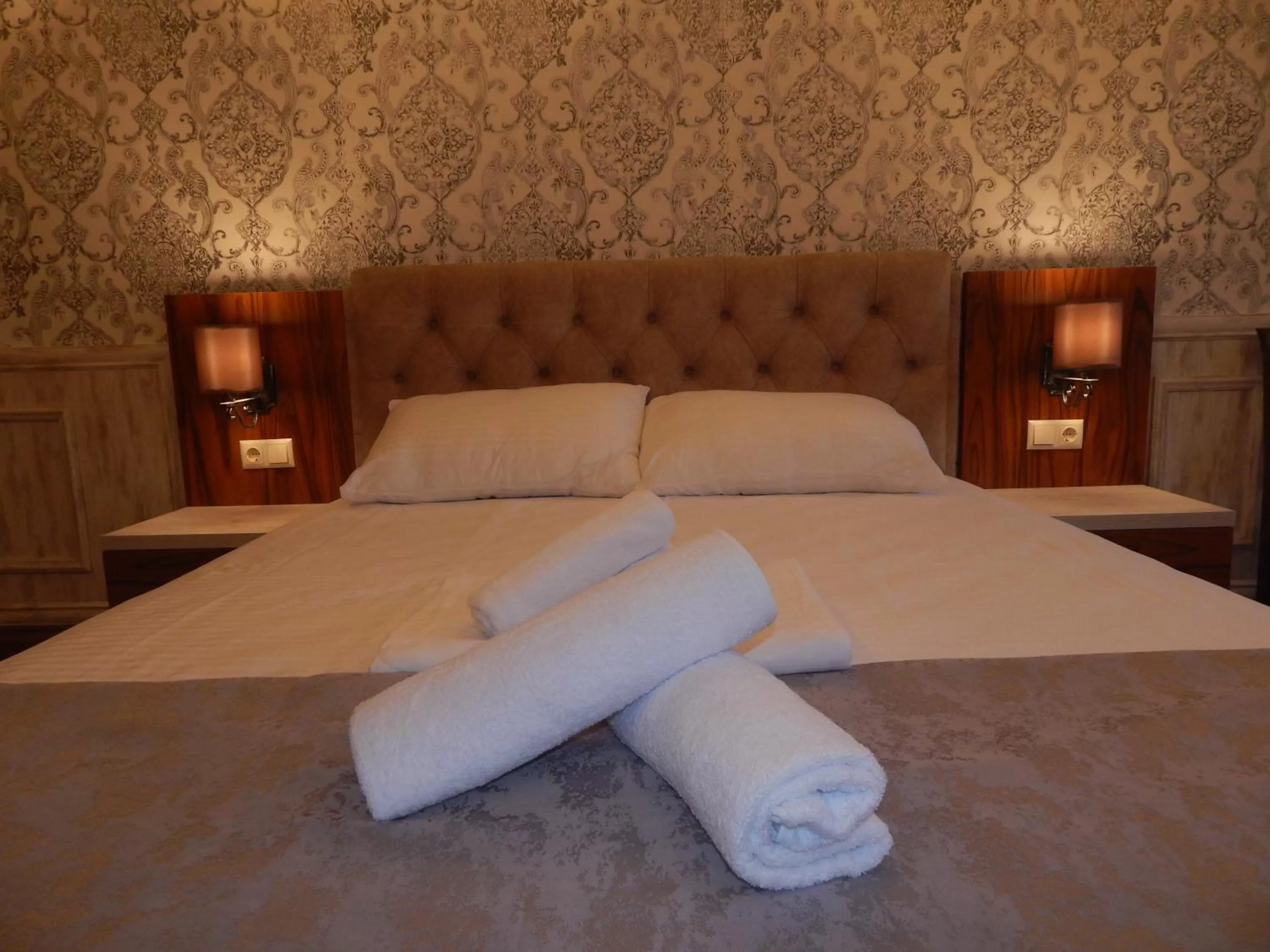 Bed in MELINI Boutique Hotel