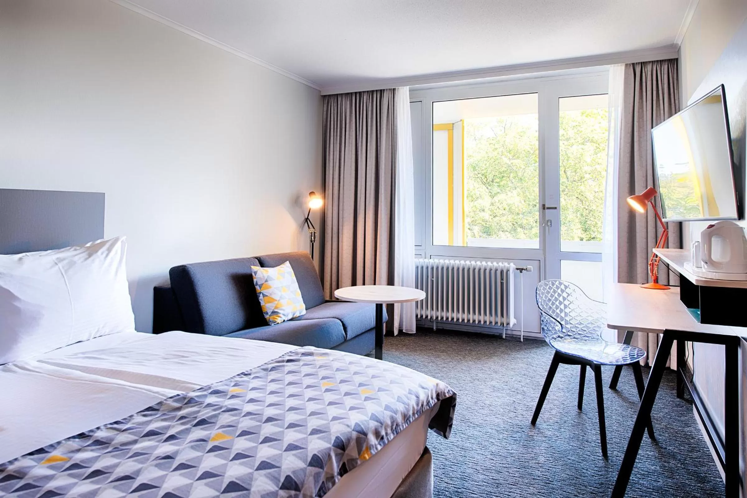 Bedroom, Bed in Holiday Inn Munich - South by IHG