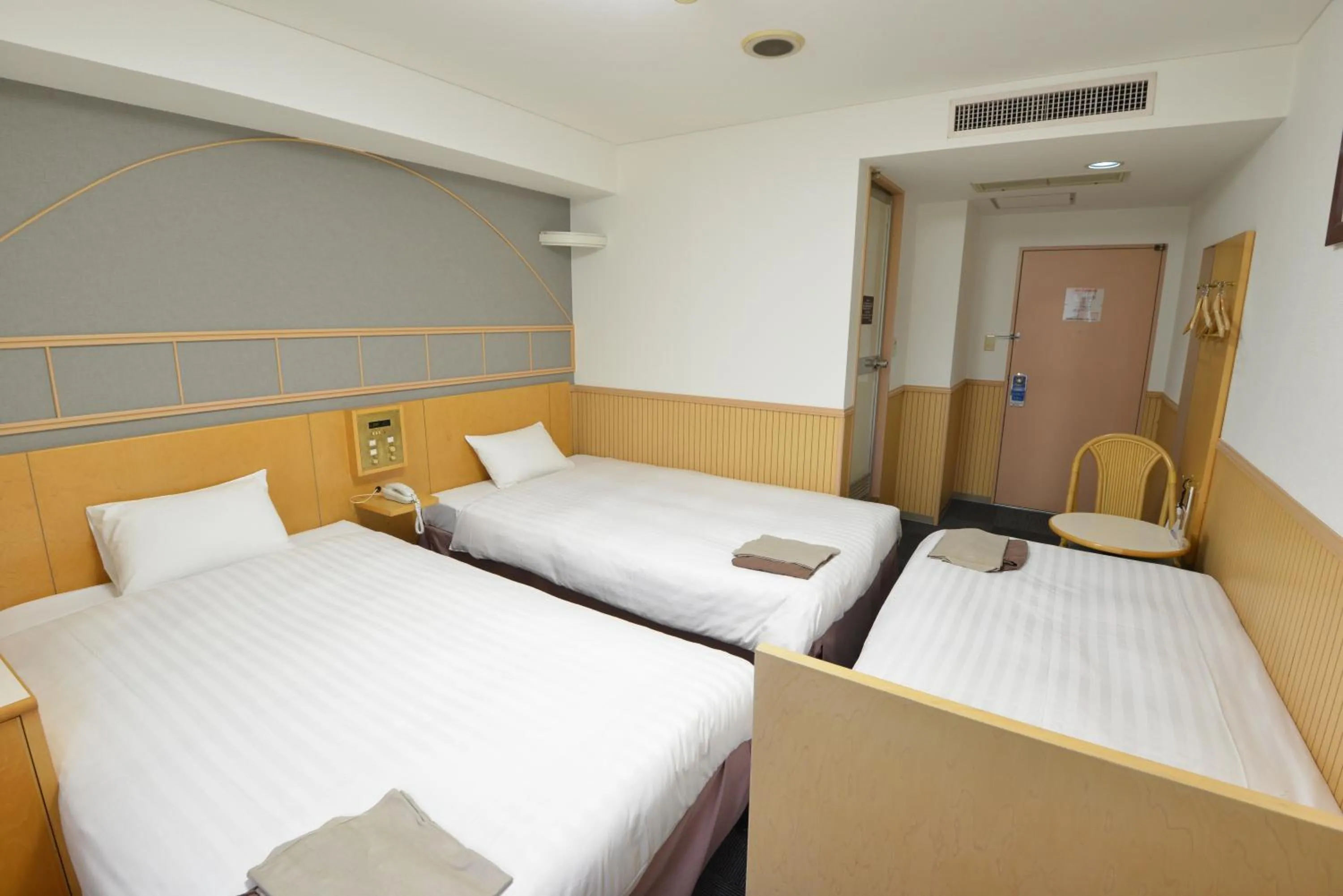 Bed in Hotel Marutani