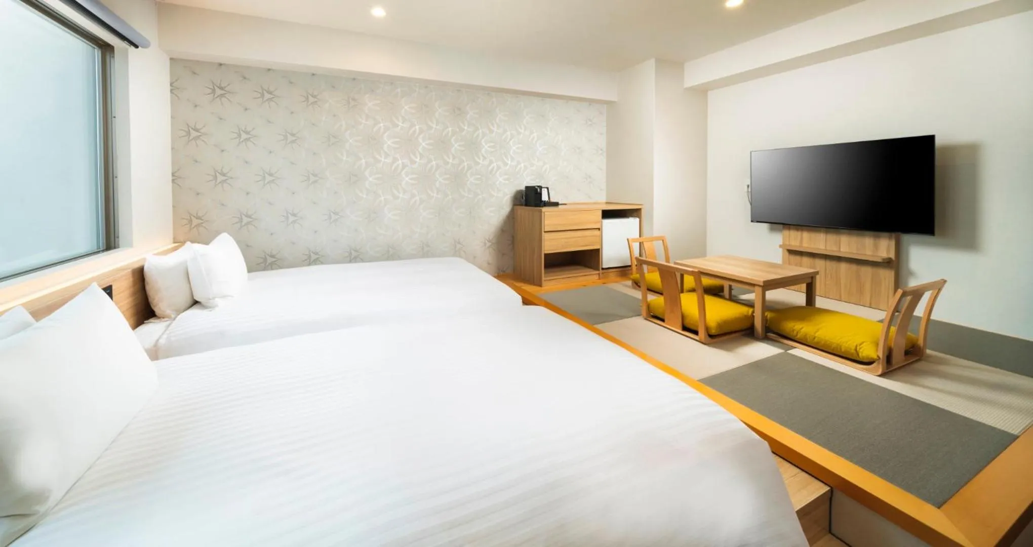 Bed in HOTEL SANSUI NAHA Ryukyu Onsen Naminoue-No-Yu