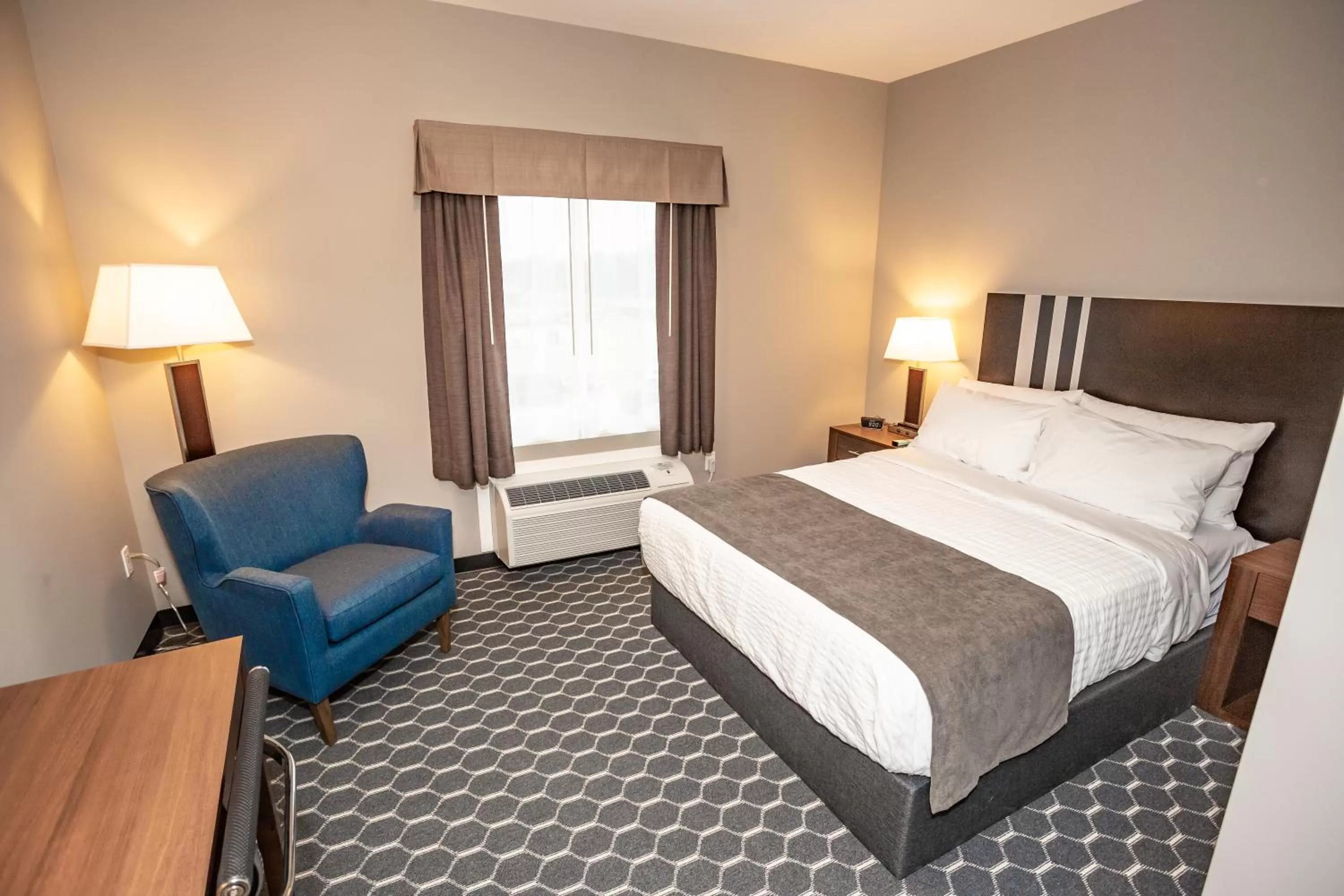 Bed in Carman Blue Crescent Hotel