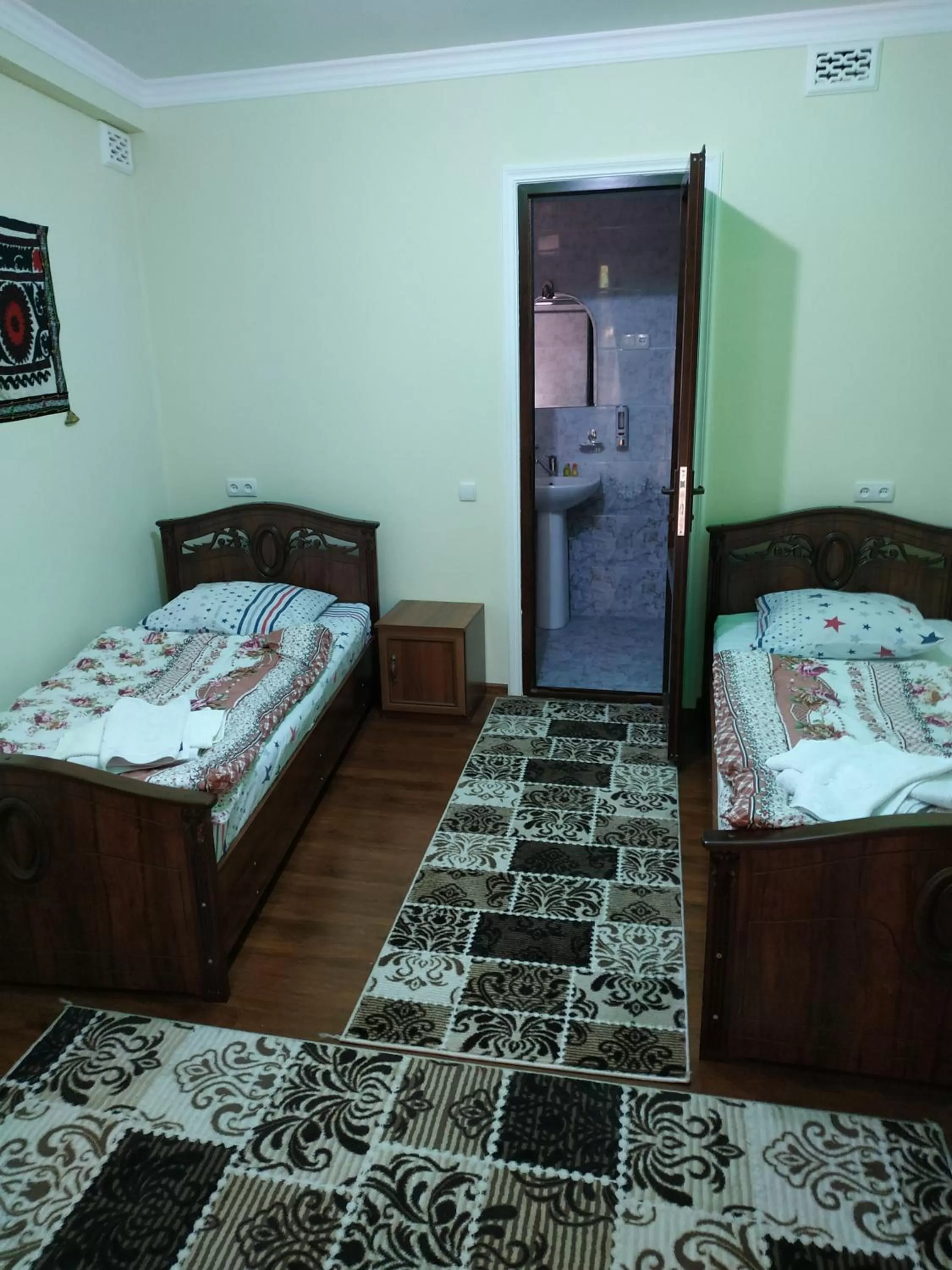 Bed in Tilyakori Hotel