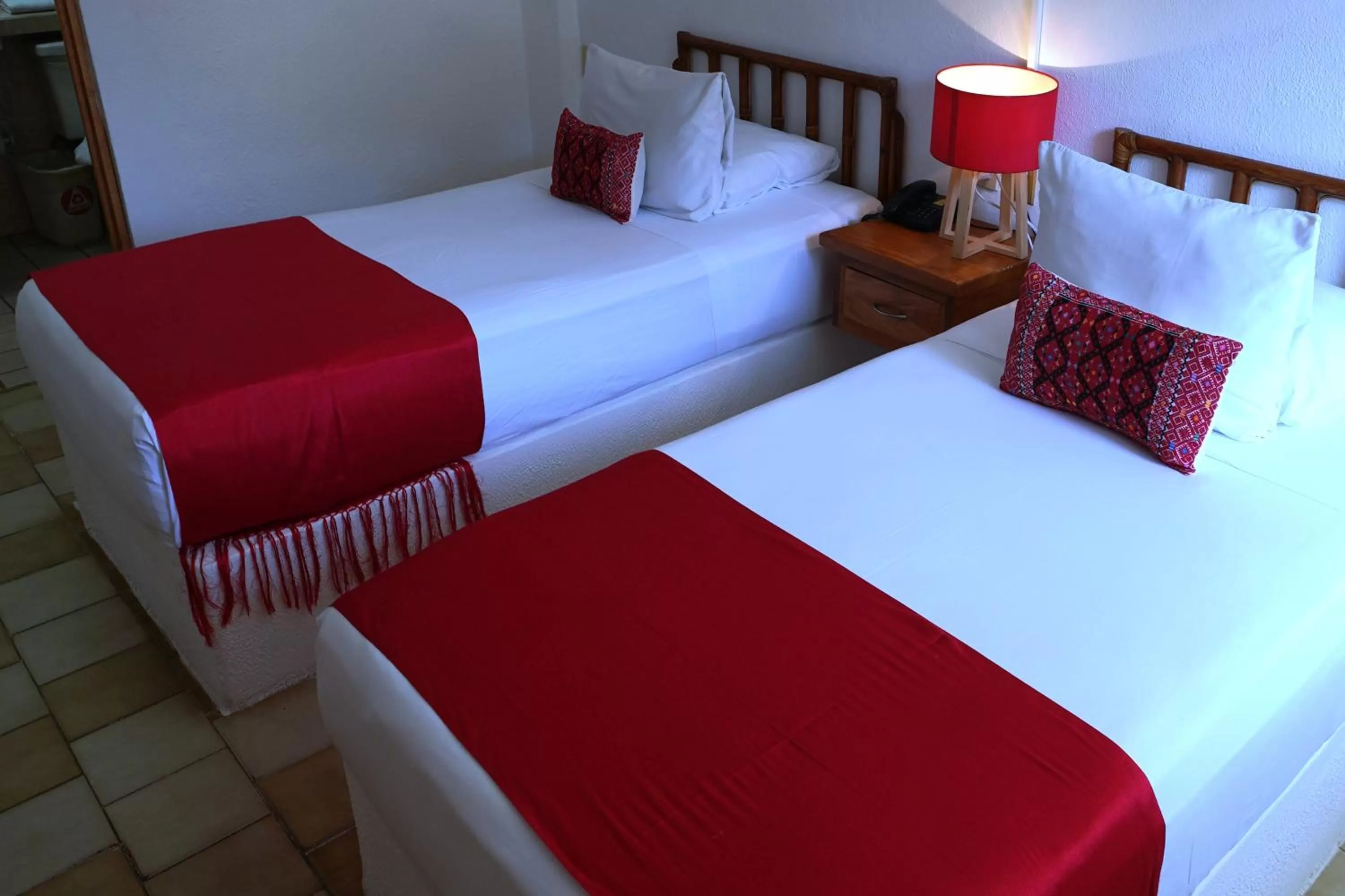 Bed in Emperador Vallarta Beachfront Hotel and Suites