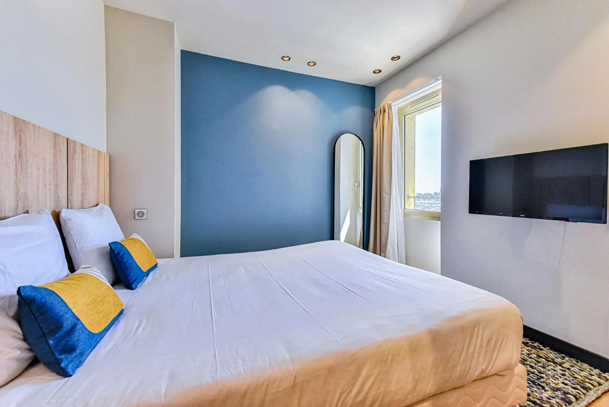 Bed in Florella Croisette Apartment