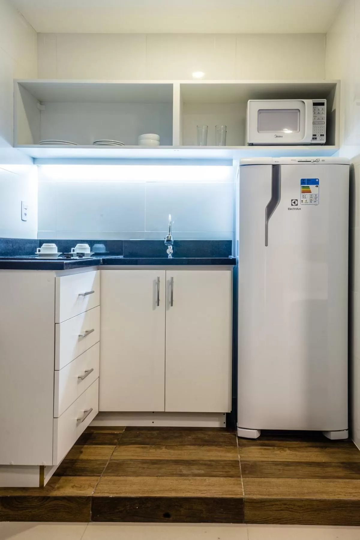 Kitchen or kitchenette, Kitchen/Kitchenette in Injoy Suítes & Aparts