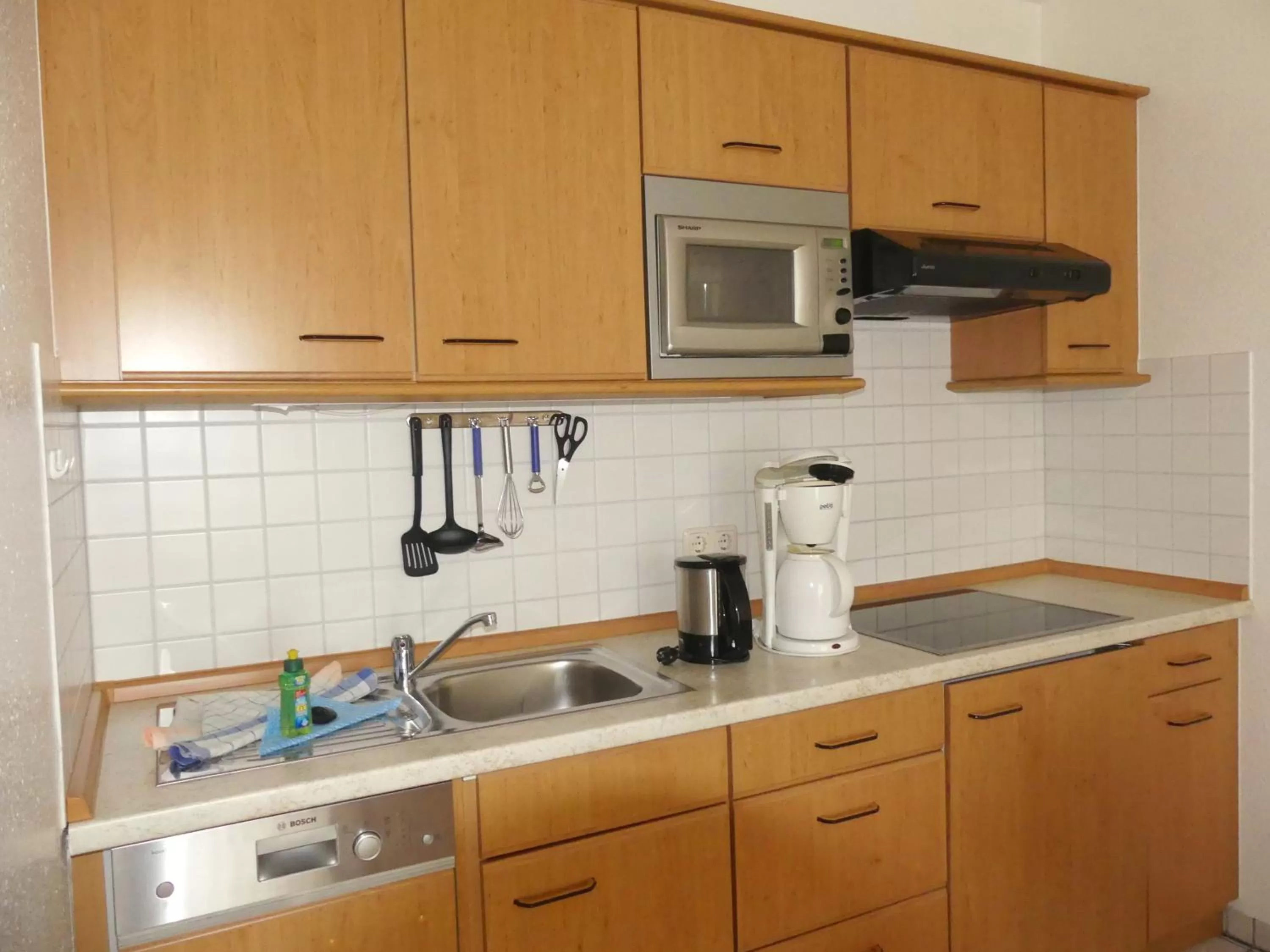 Kitchen or kitchenette, Kitchen/Kitchenette in Apartmenthaus Binzer Sterne