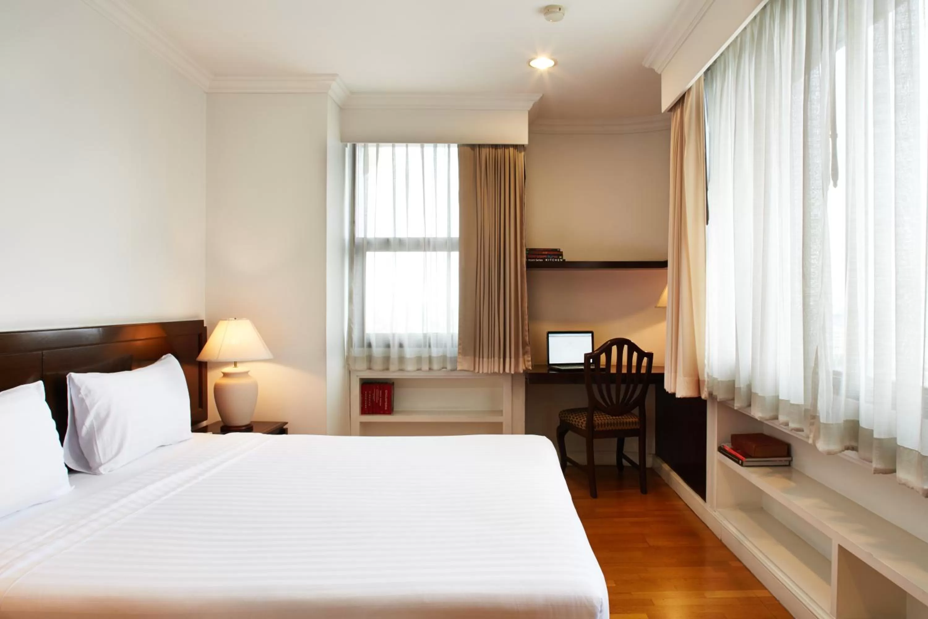 Bed in Riverine Place Hotel and Residence