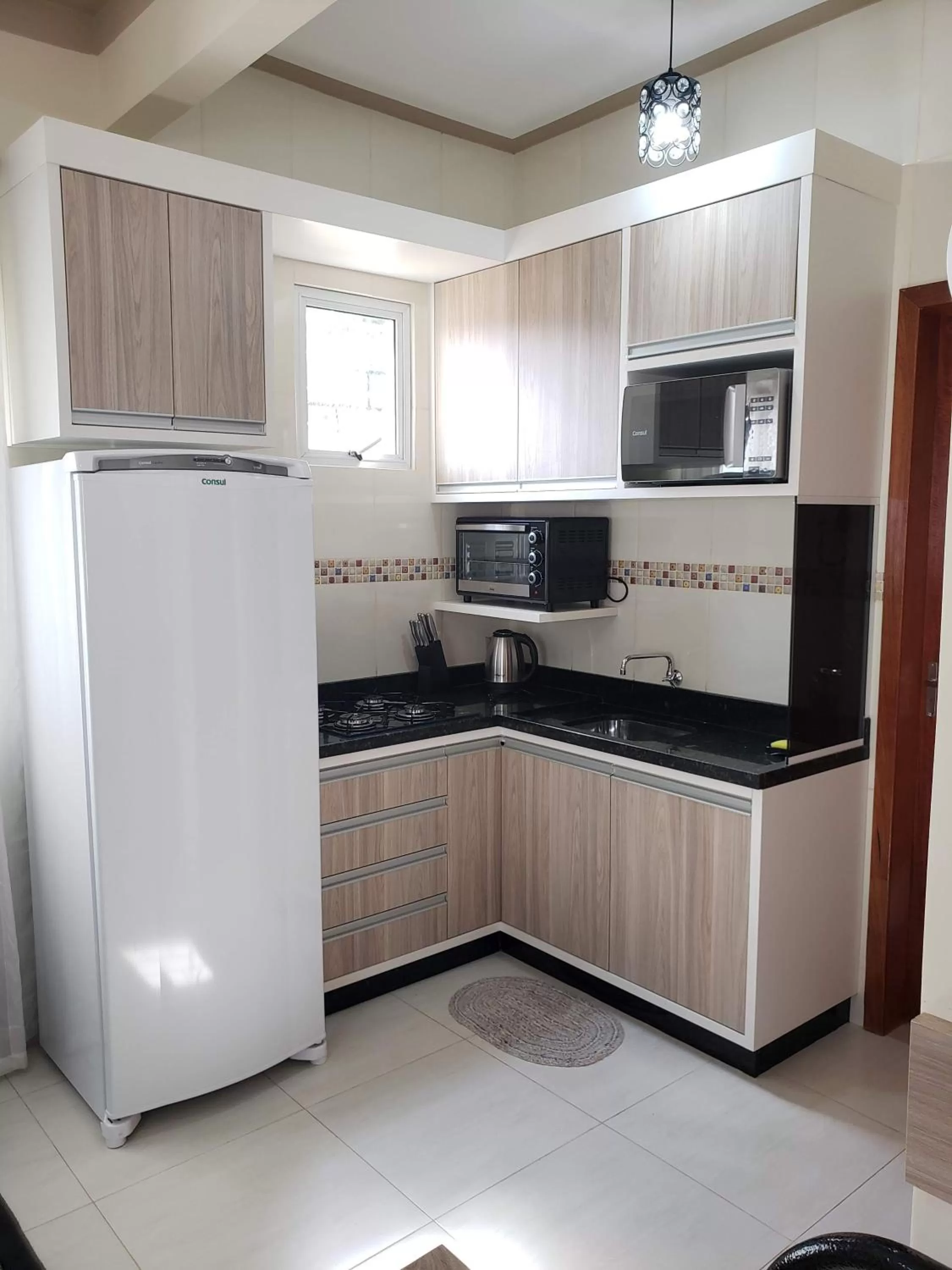 Kitchen or kitchenette in Felipe Family Houses - Casas de temporada