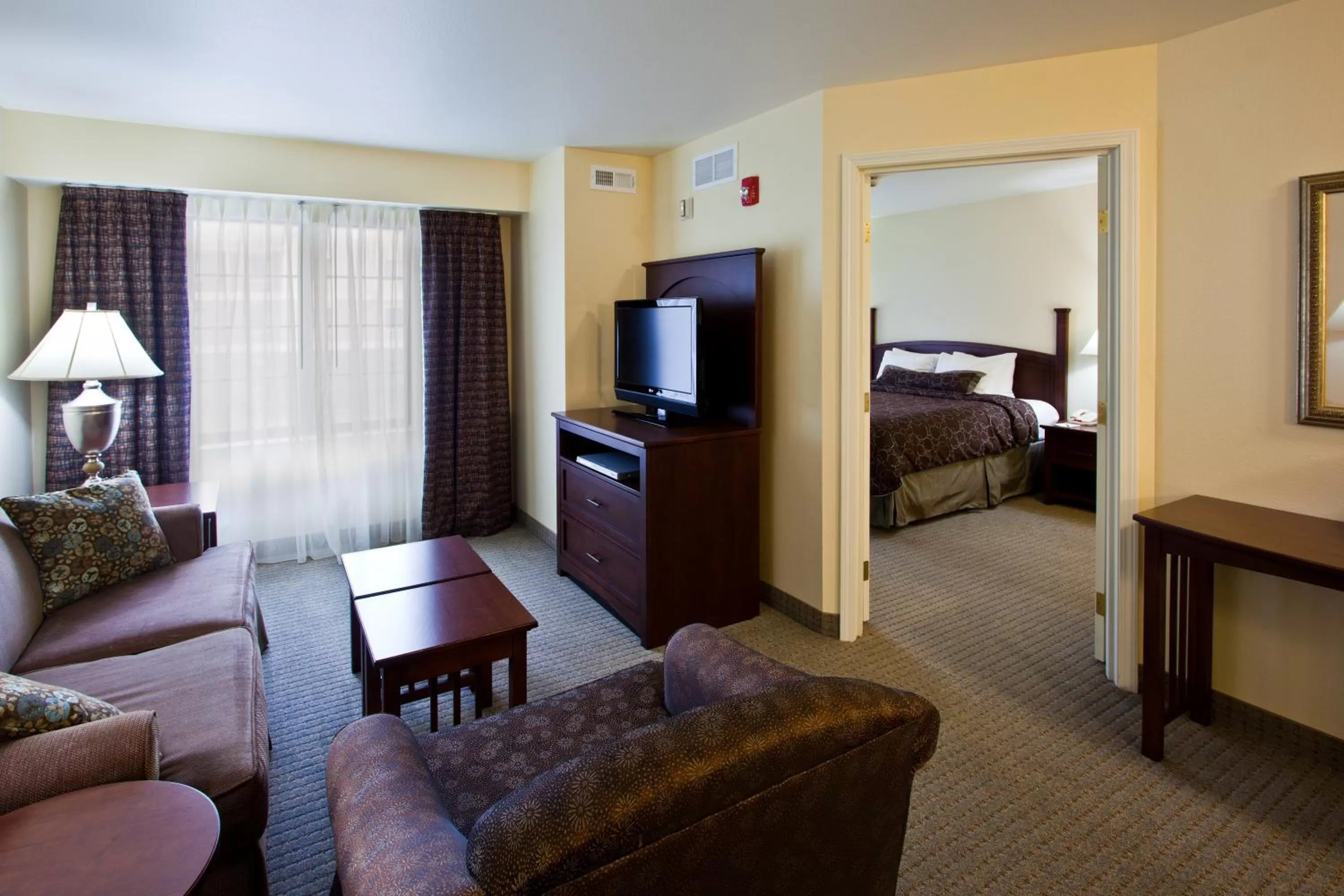 Photo of the whole room, Bed in Staybridge Suites Lansing-Okemos by IHG