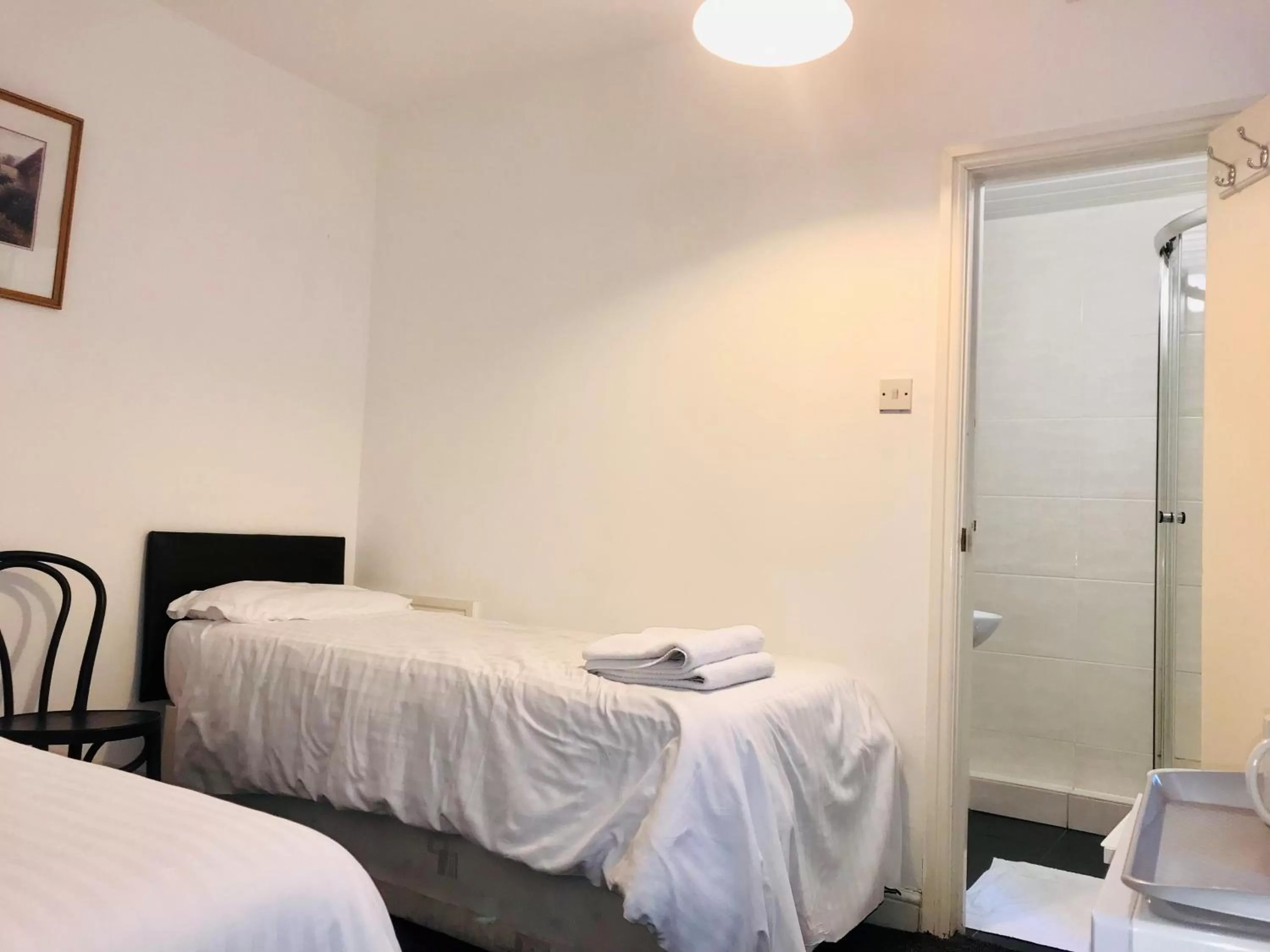 Bed in Amhurst Hotel