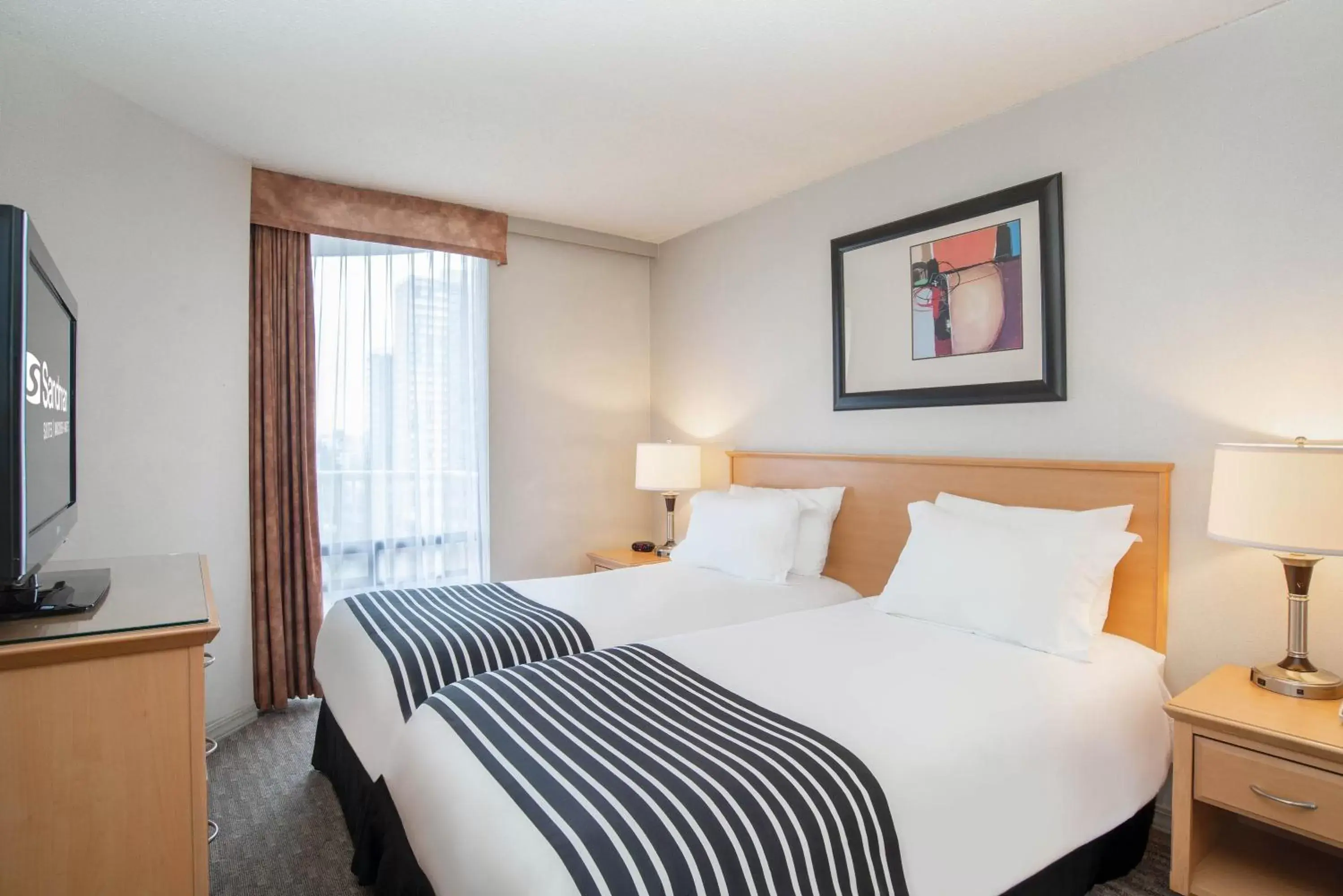 One-Bedroom Queen Suite with City View in Sandman Suites Vancouver on Davie One-Bedroom Queen Suite with City View in Sandman Suites Vancouver on Davie