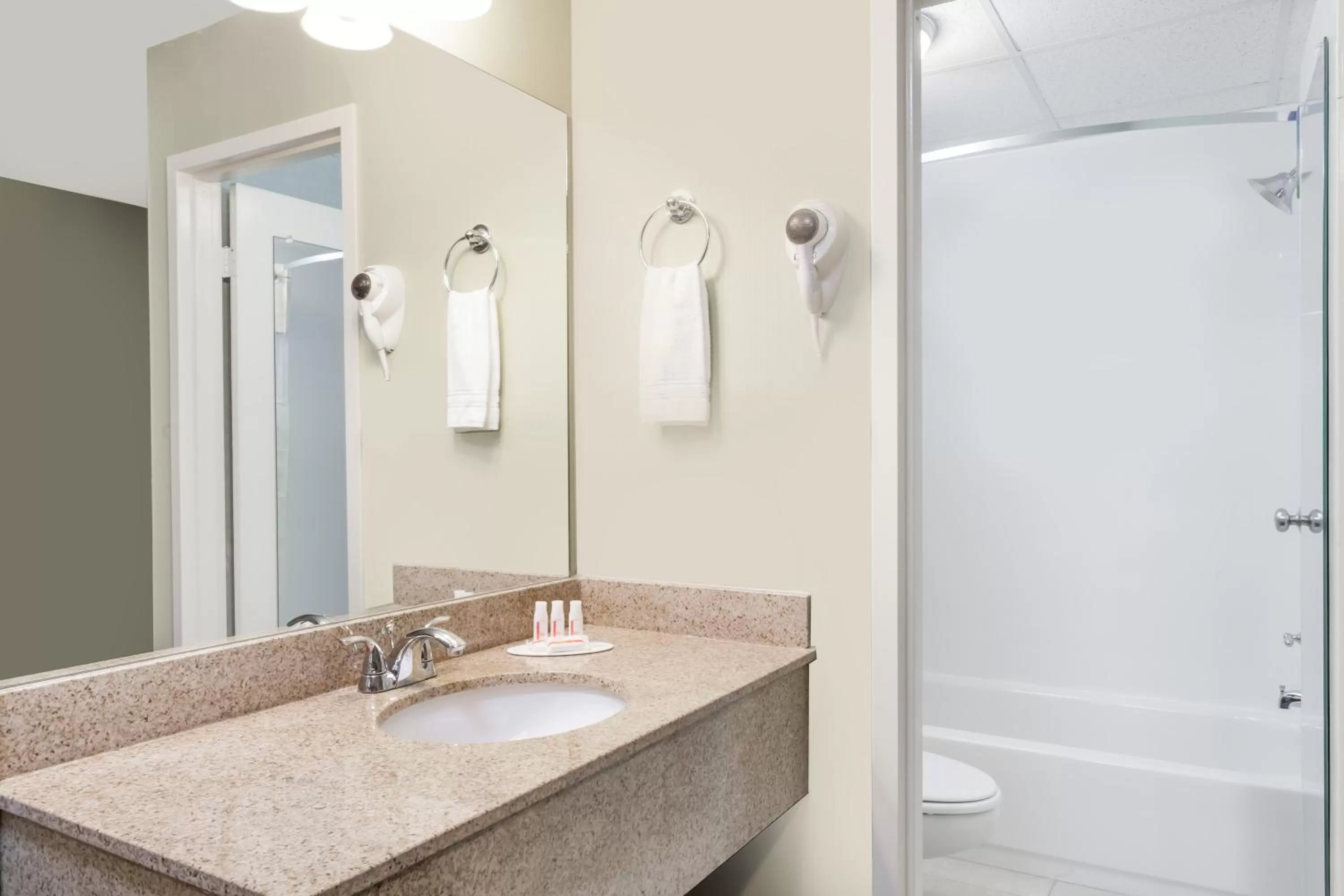 Bathroom in Days Inn by Wyndham Windsor Locks / Bradley Intl Airport