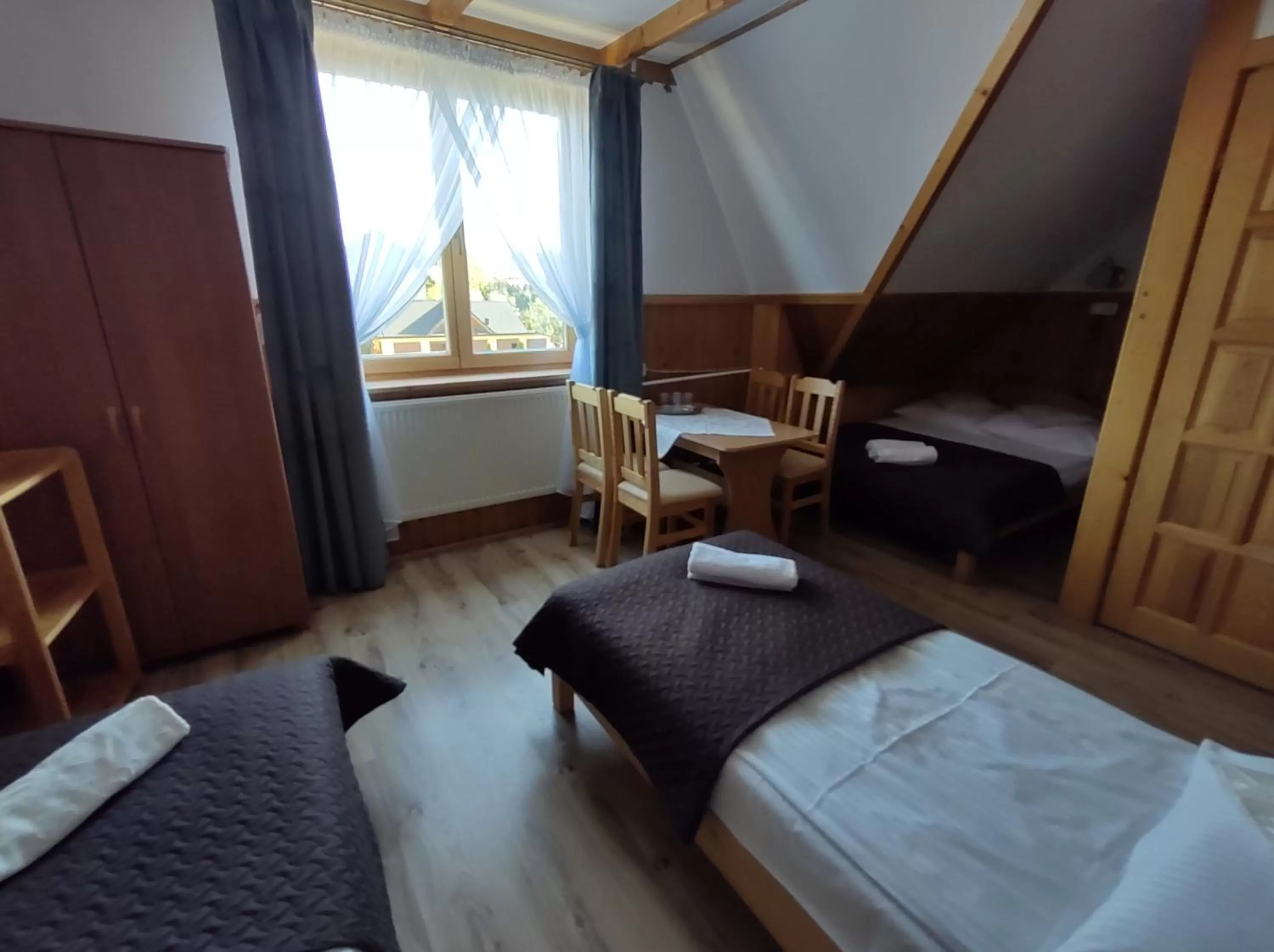 Bed in Noclegi U Reni