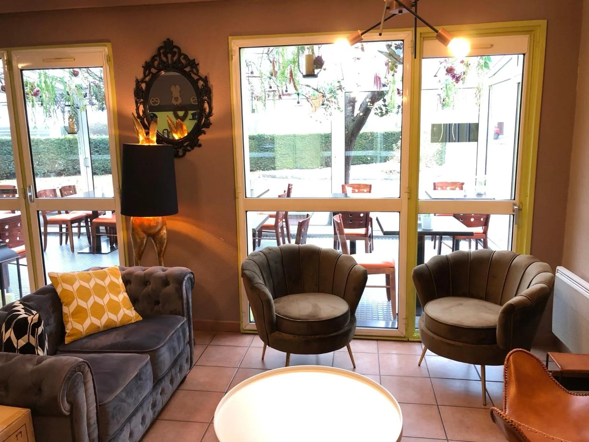 Living room in Hotel Arc-En-Ciel Colmar Contact Hotel