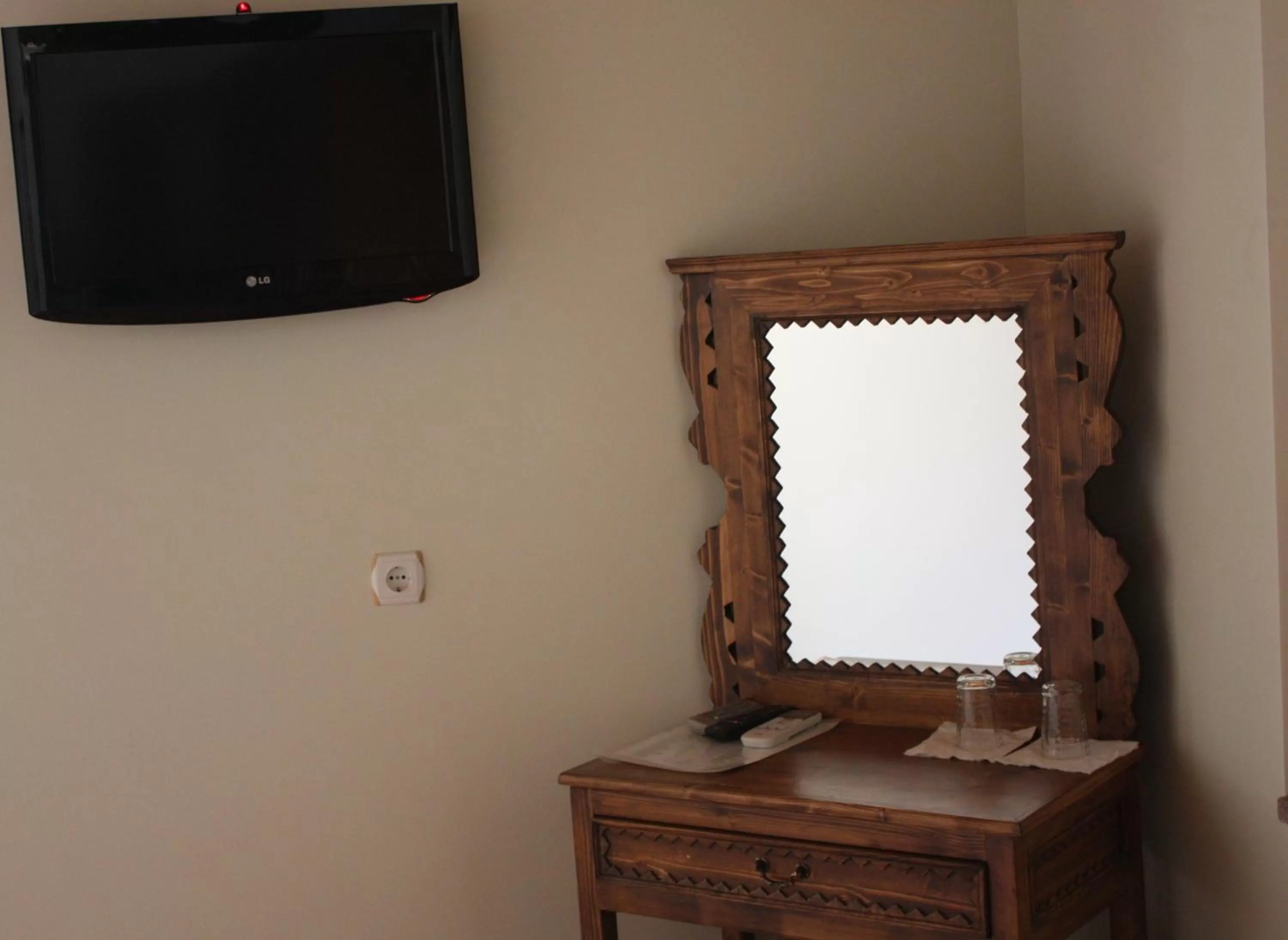 TV/Entertainment Center in Hera Hotel