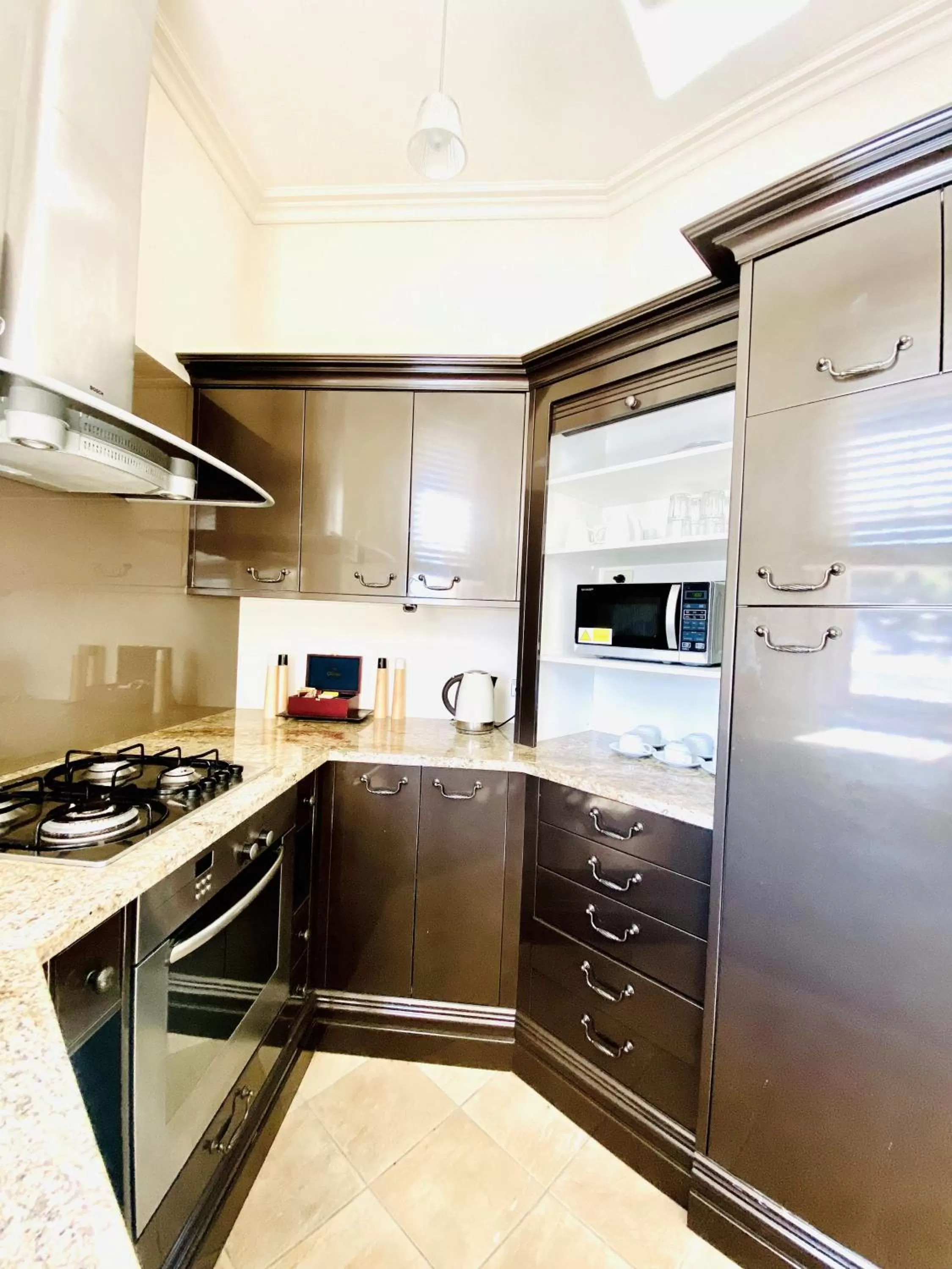 Kitchen or kitchenette in The Esplanade Hotel