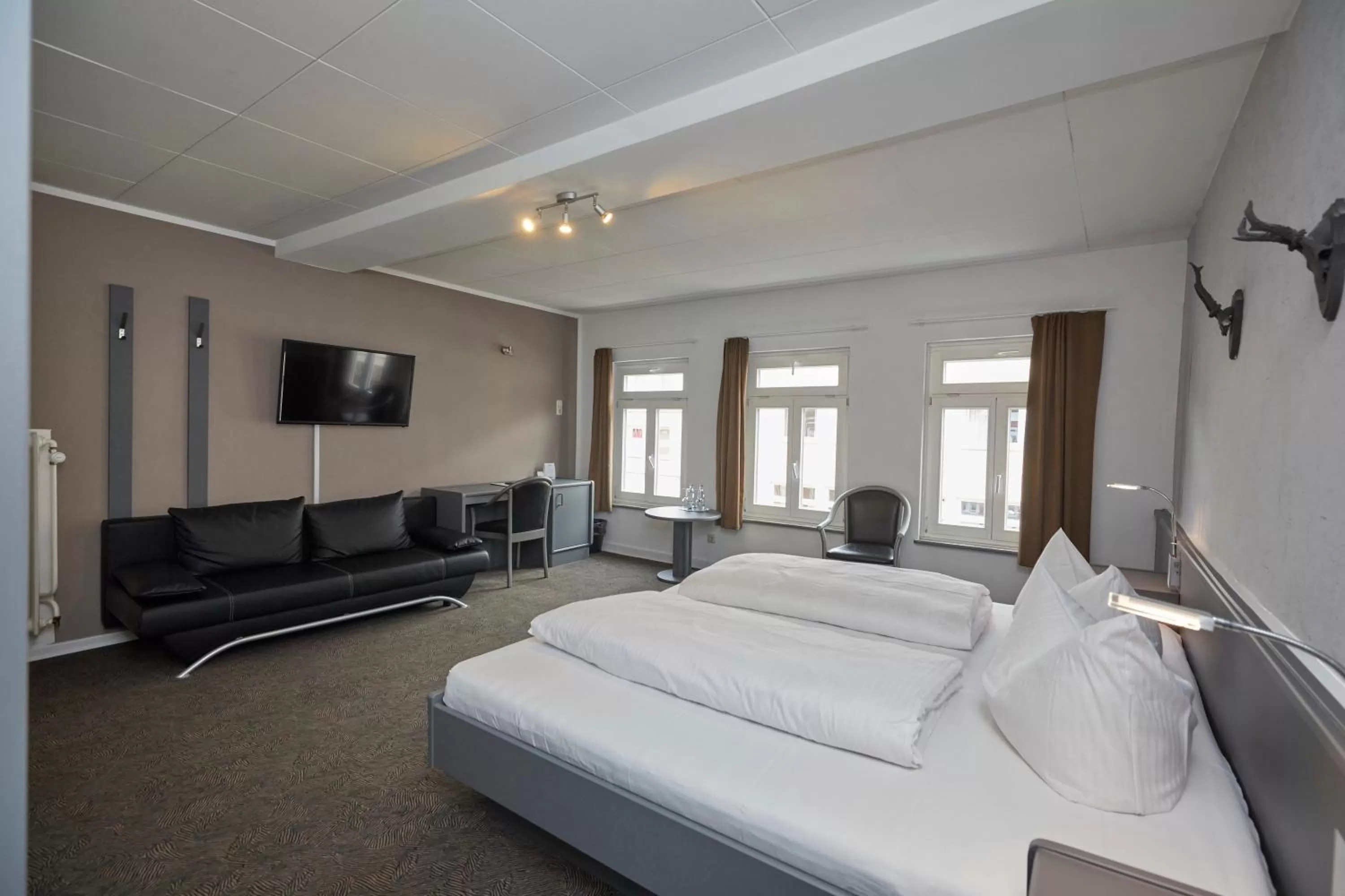 Photo of the whole room, Bed in Hotel Schlemmer Das familäre Altstadt - Hotel mit Herz