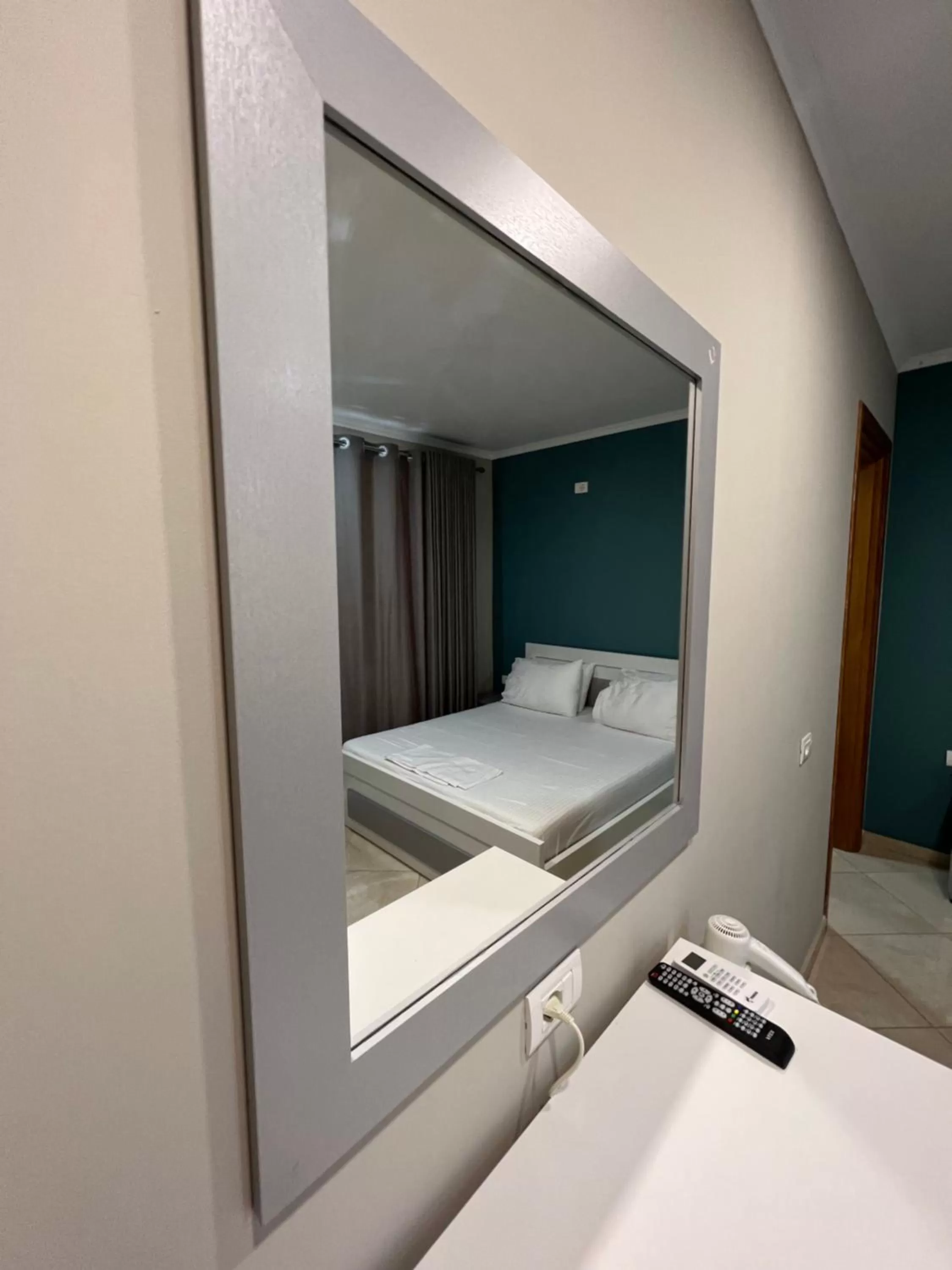 Communal lounge/ TV room, Bathroom in Aphrodite Garden Rooms & Apartment