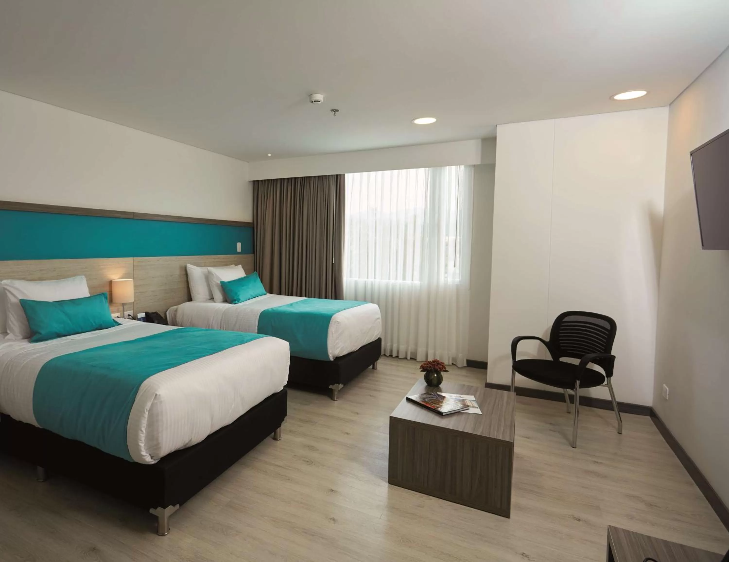 Photo of the whole room, Bed in Hotel Nivari Duitama