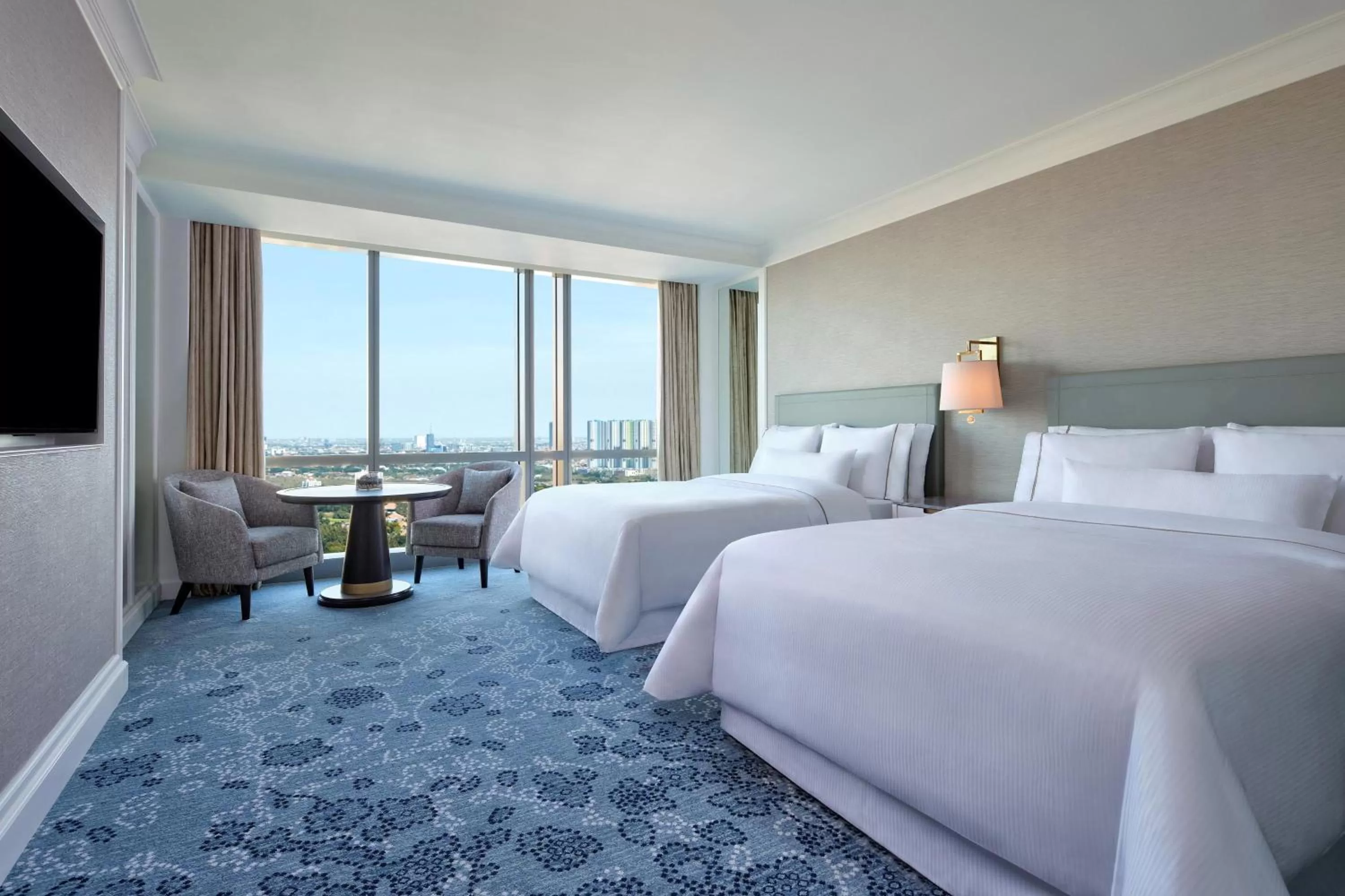 Photo of the whole room, Bed in The Westin Surabaya