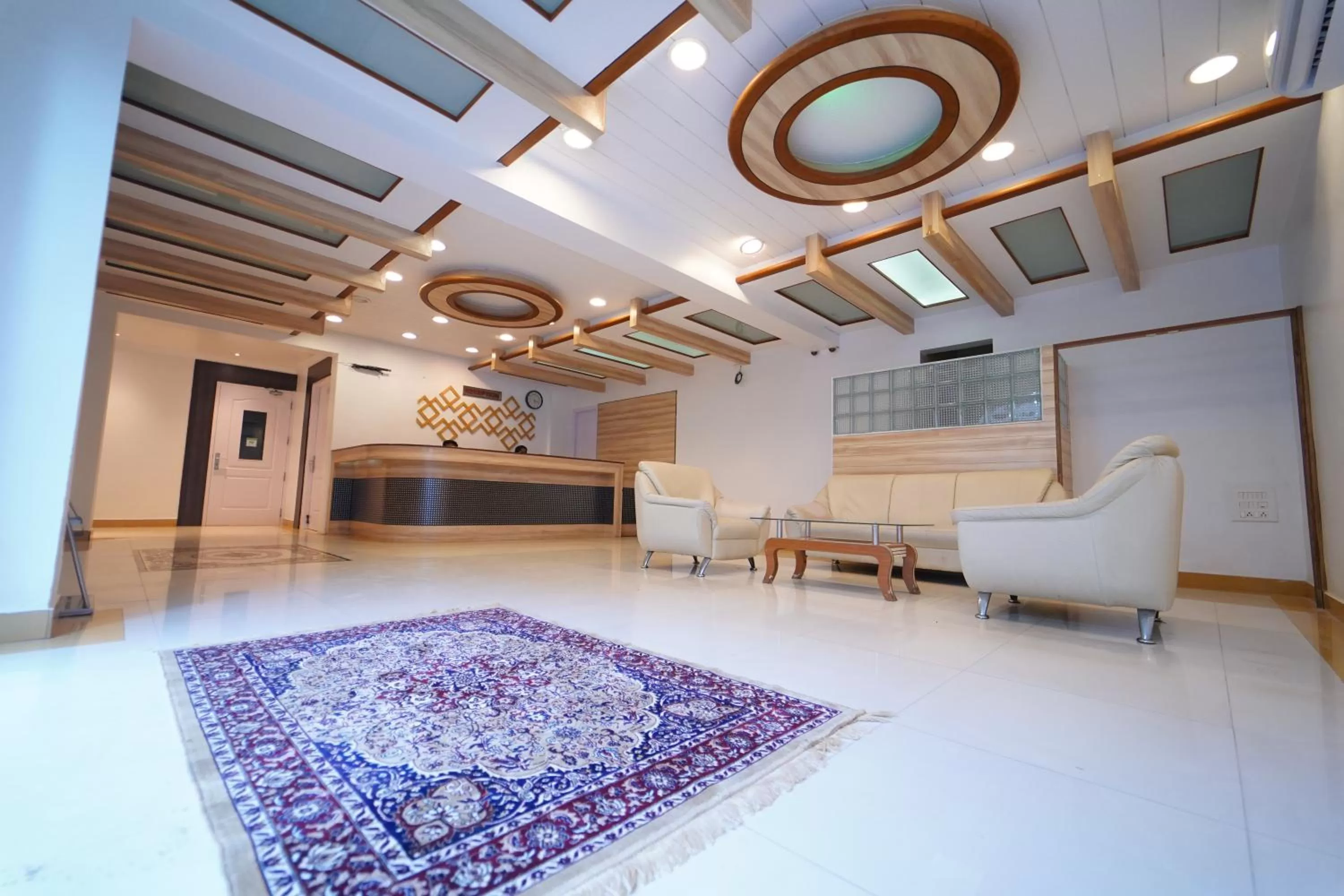 Lobby or reception in Hotel Palmyra Grand Inn