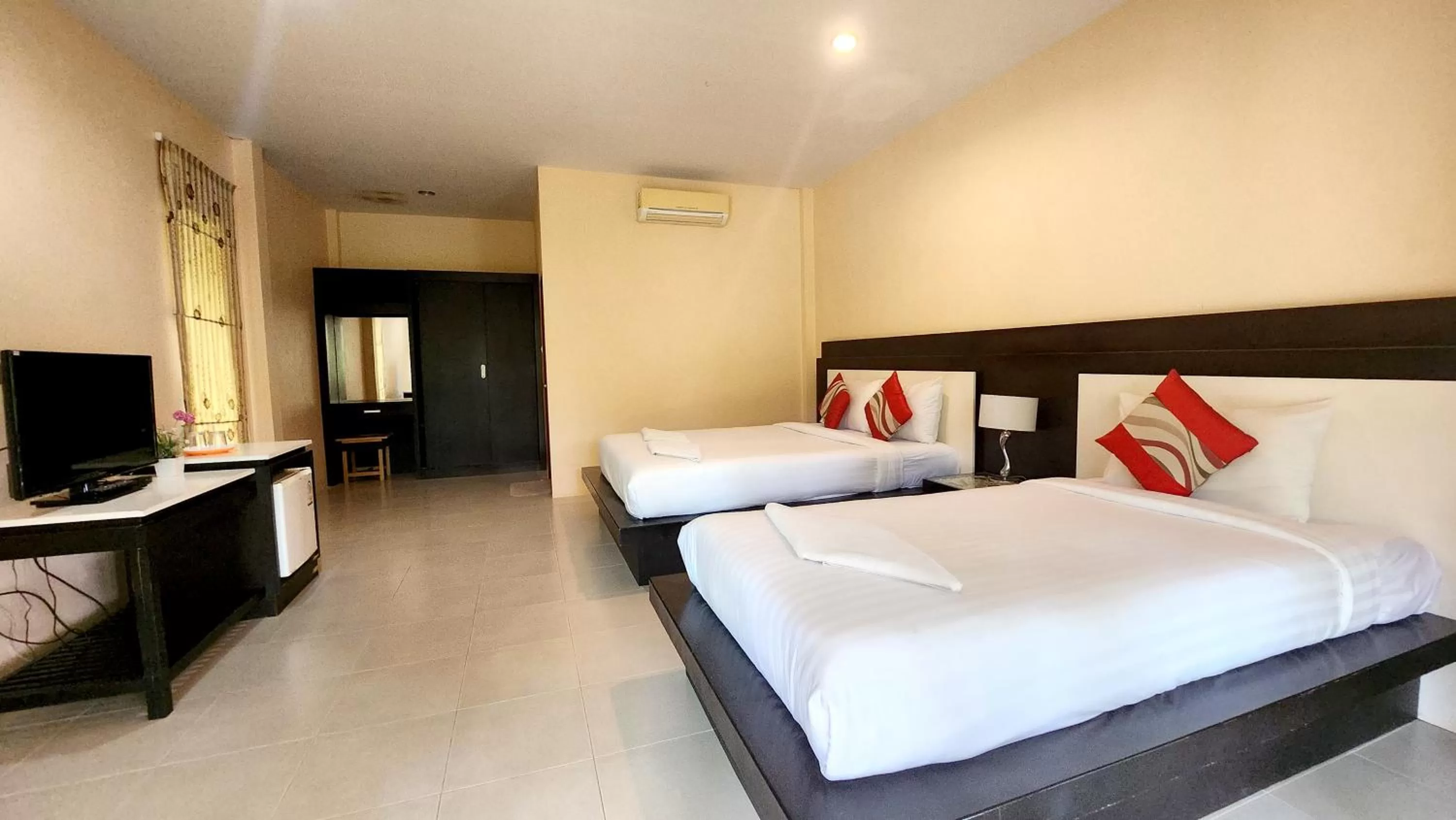 Bed in Sawaddee Aonang Resort