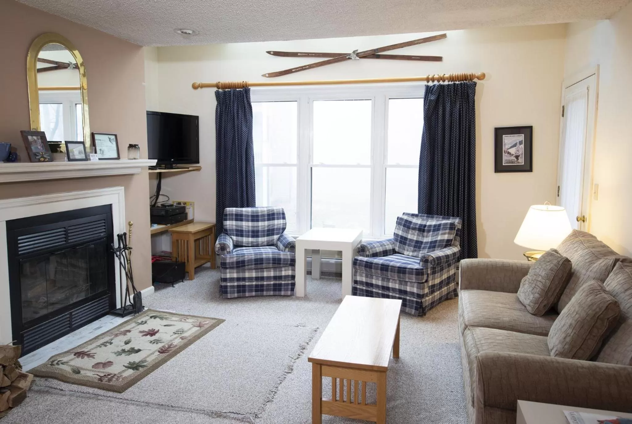 Living room in Winterplace at Okemo, A Vail Resorts Property