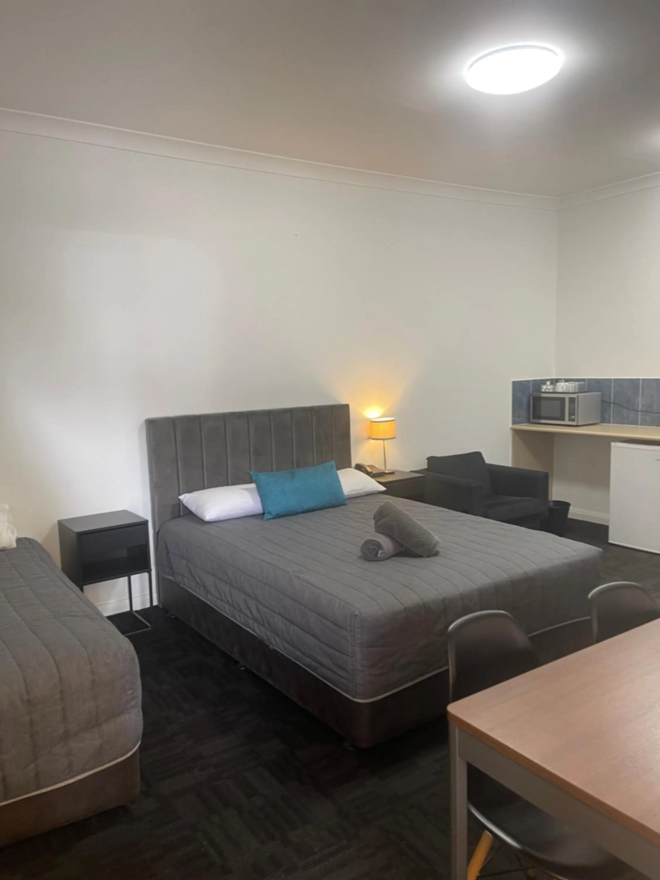 People, Bed in City West Motel