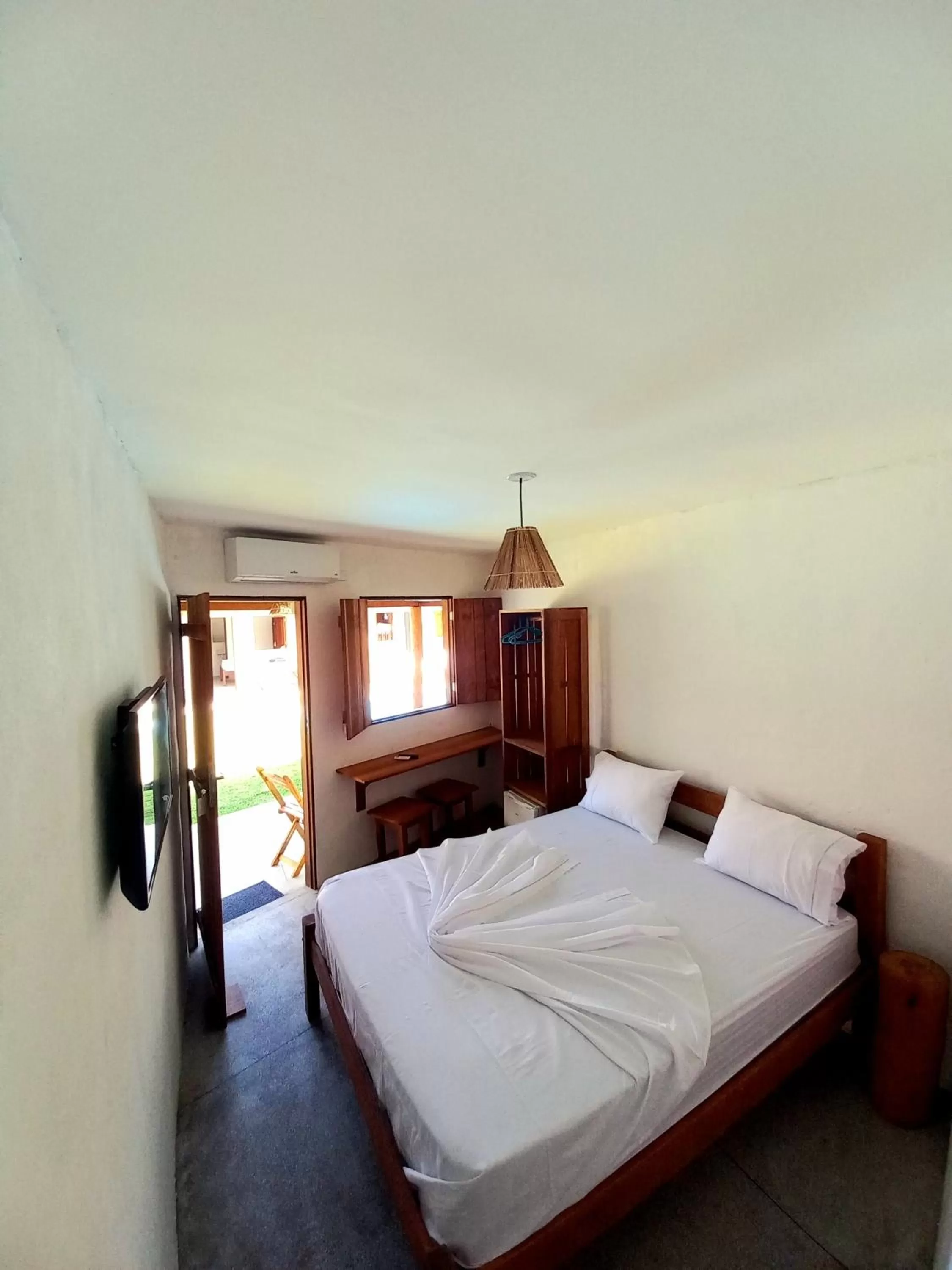 Bed in Pousada Ventos e Velas