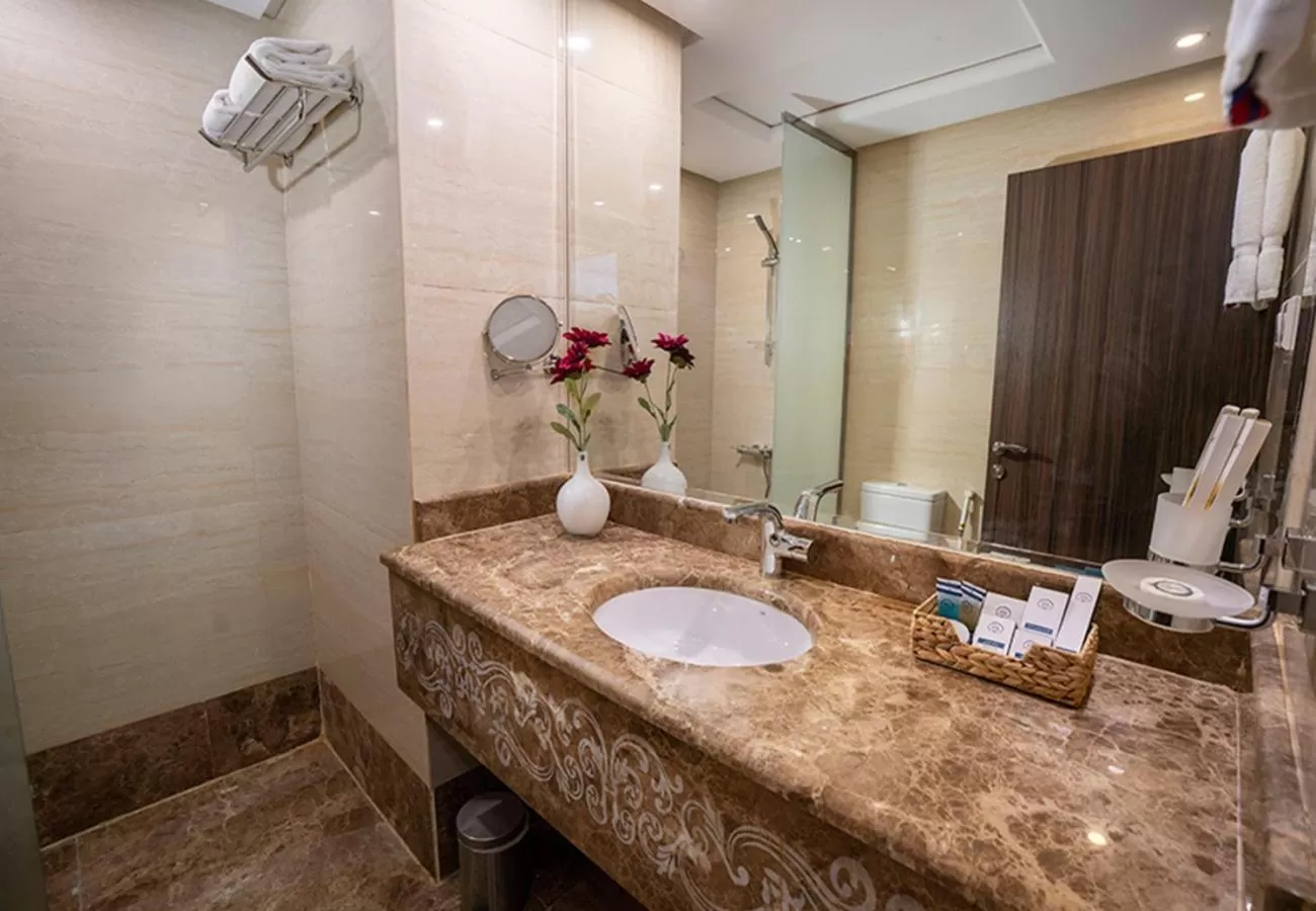 Bathroom in Aquila Al Hamra Hotel