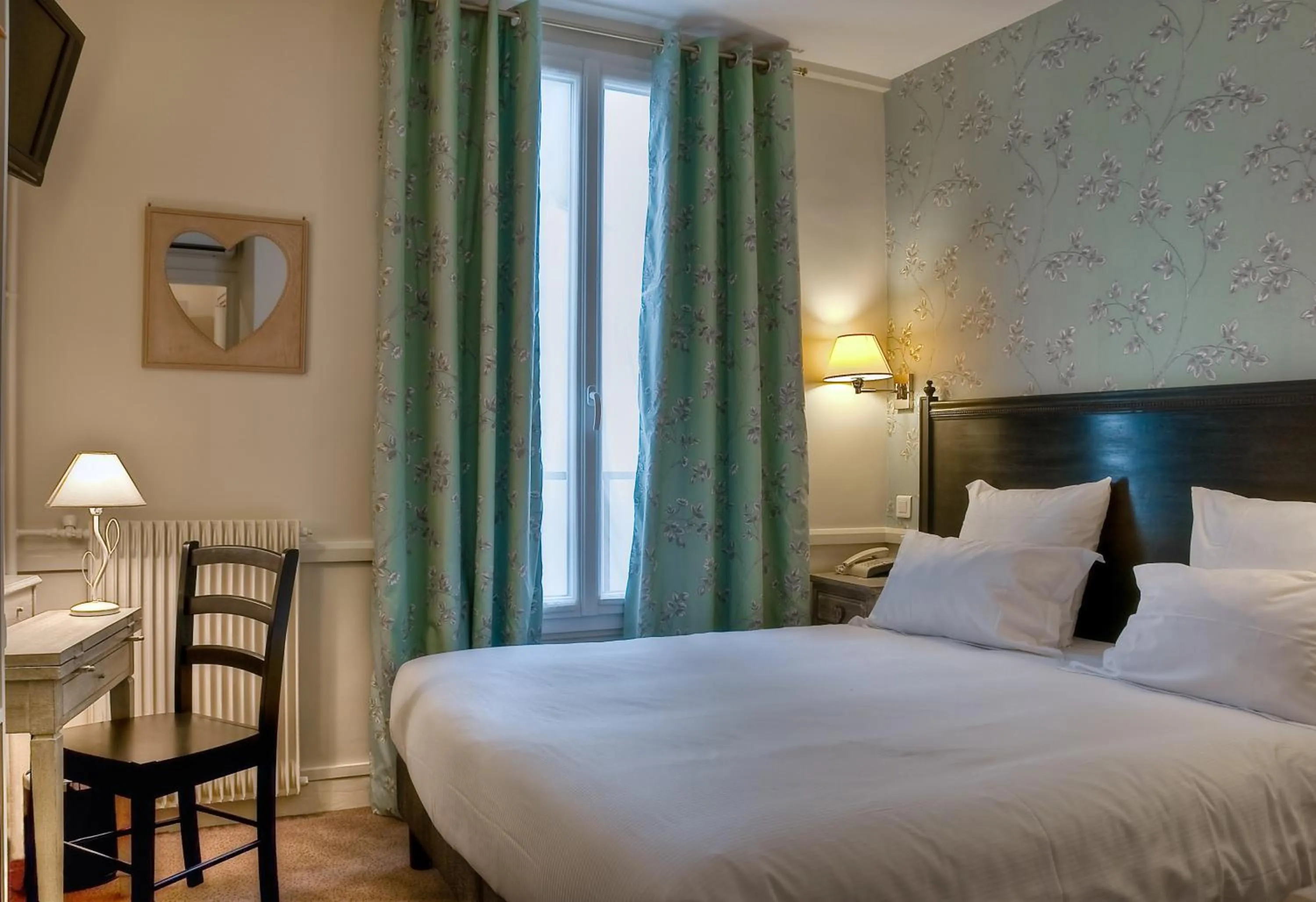 Photo of the whole room, Bed in Hôtel de la Motte Picquet