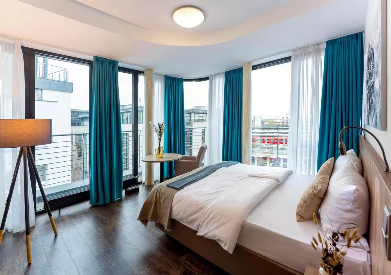 Bed in KONCEPT HOTEL Benedikt