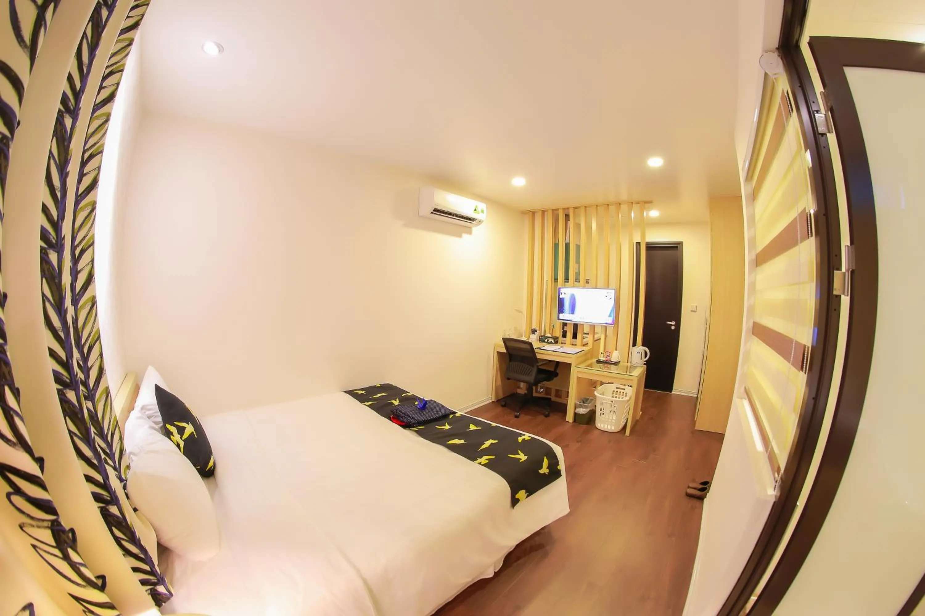 Bed in Momizi Business Hotel