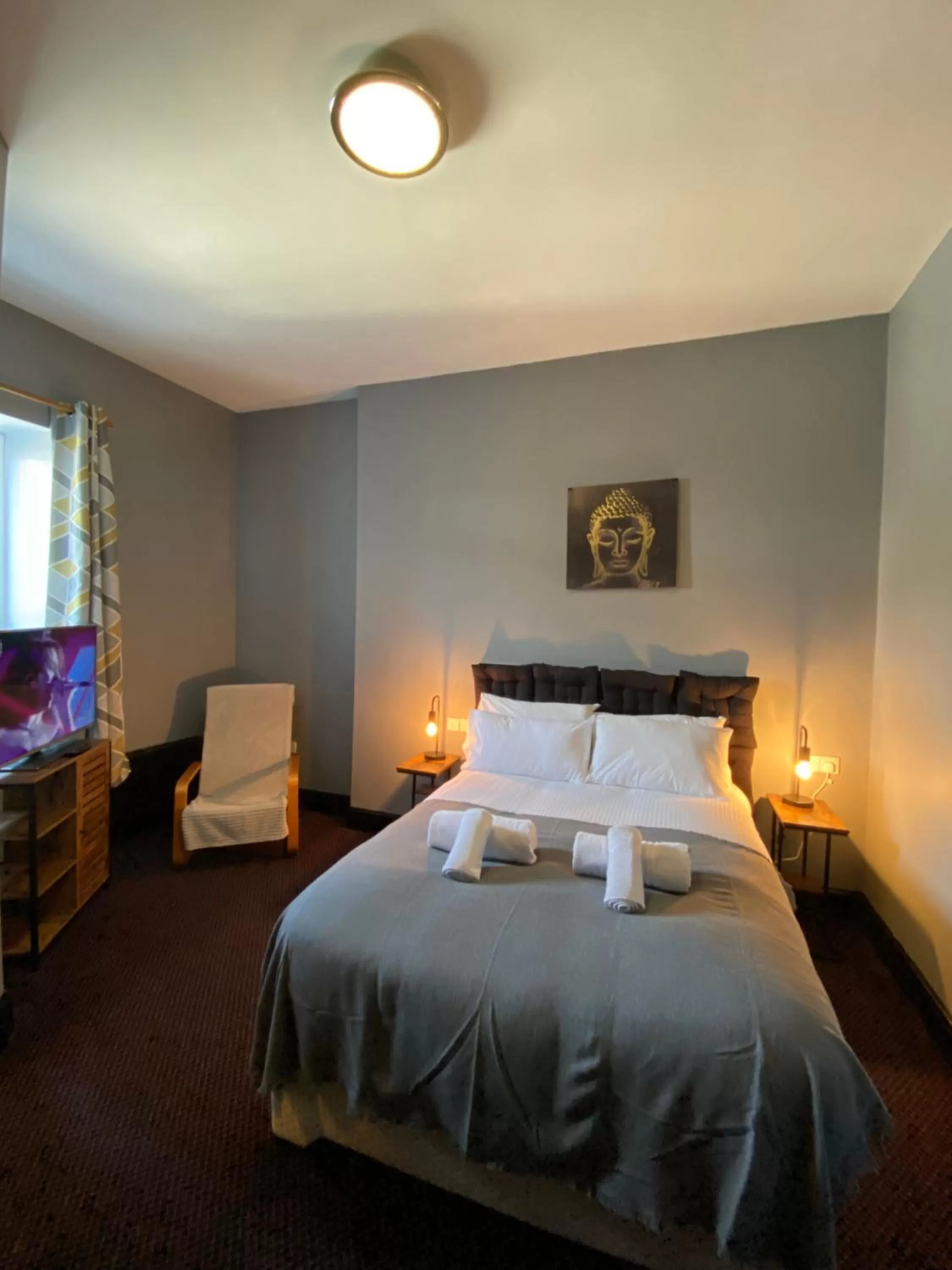 Bed in Bay view rooms at Mentone Hotel