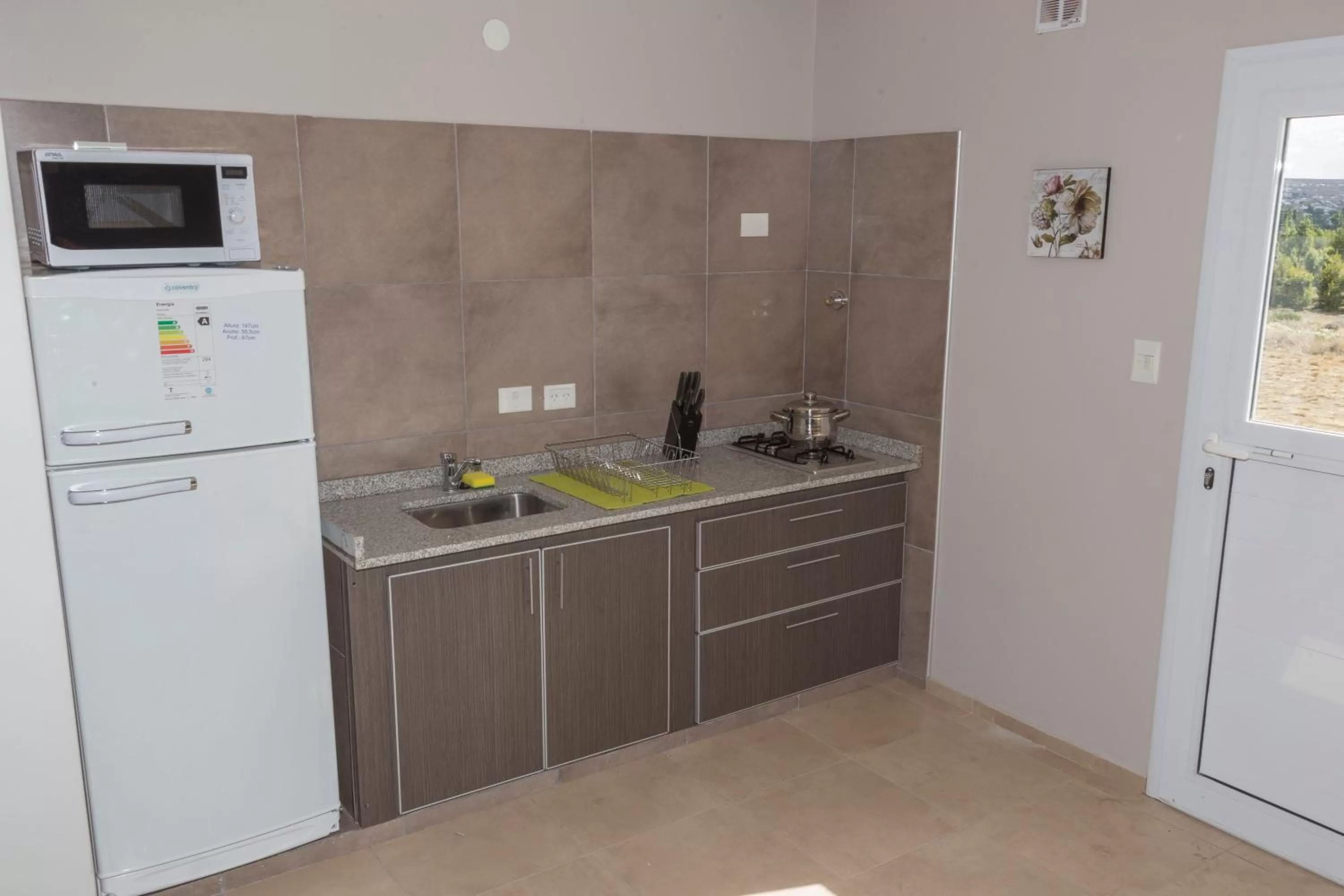 Kitchen or kitchenette in Tierra Tehuelche Hostería y Aparts