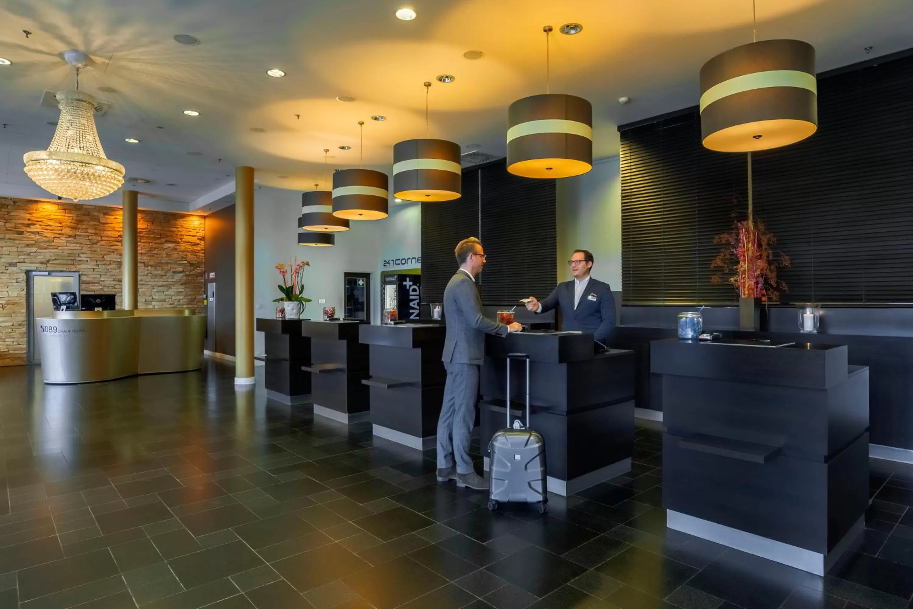 Lobby or reception in The Rilano Hotel München